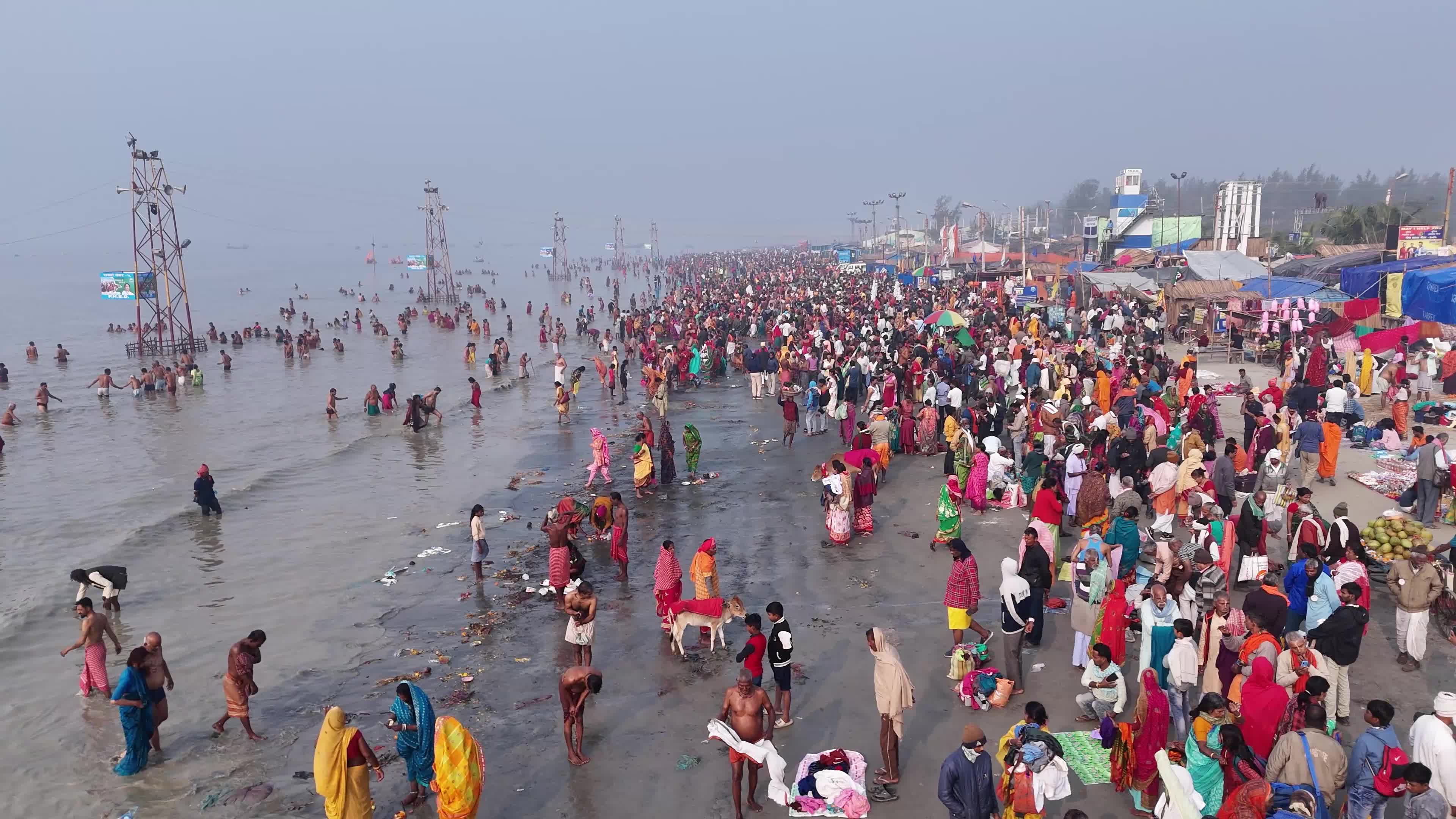 Hindu Pilgrims Taking Holy Dip at Gangasagar Island During Annual Gangasagar Mela