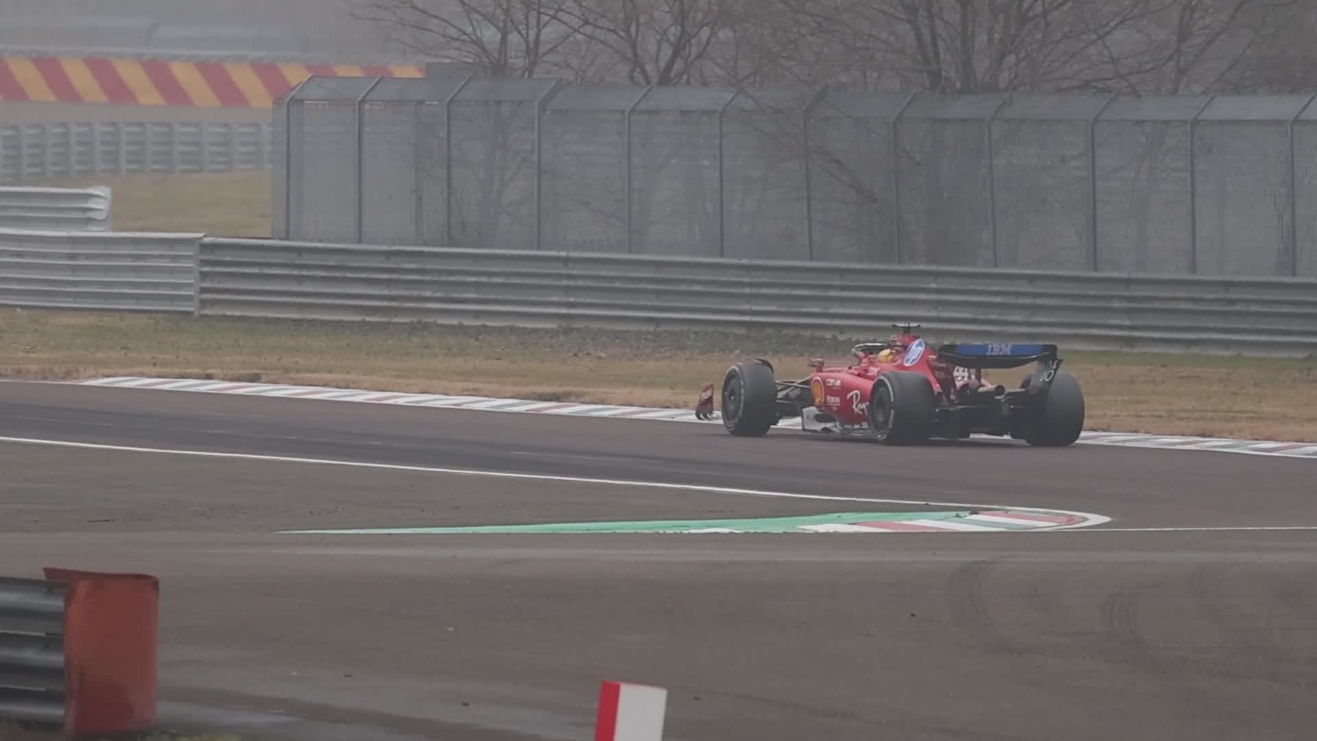 Lewis Hamilton drives on the track during the first day of tests as a Scuderia Ferrari F1 driver at the Fiorano Circuit in Maranello