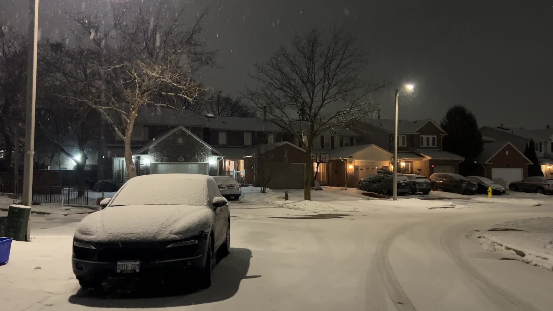 Snow falling at night in Toronto, Canada
