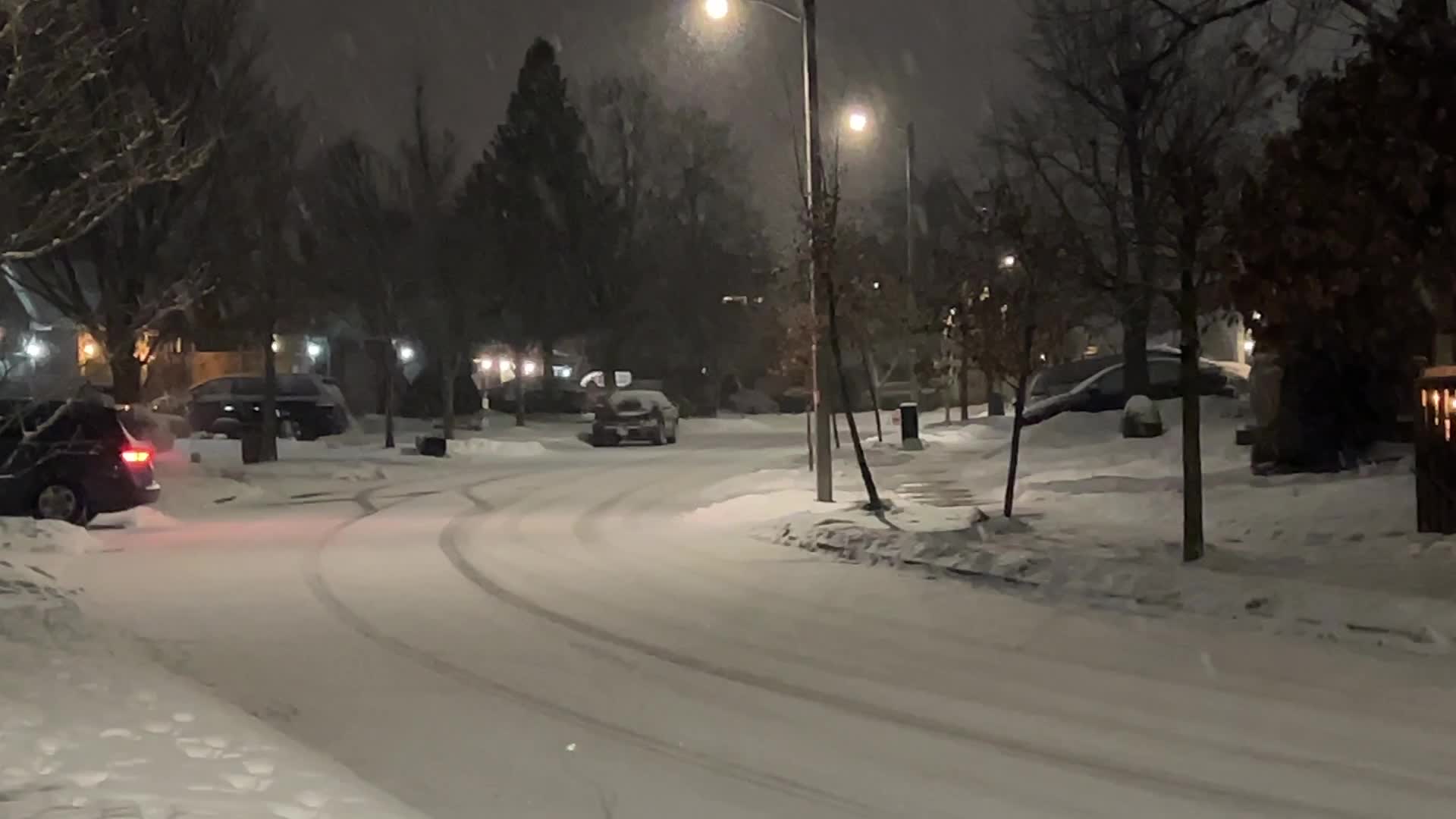Snow falling at night in Toronto, Canada