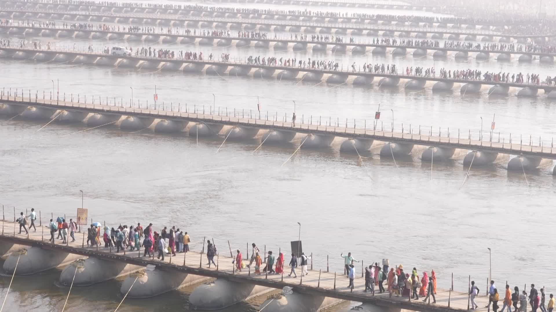 Devotees crossing pontoon bridges at "Maha Kumbh Mela"