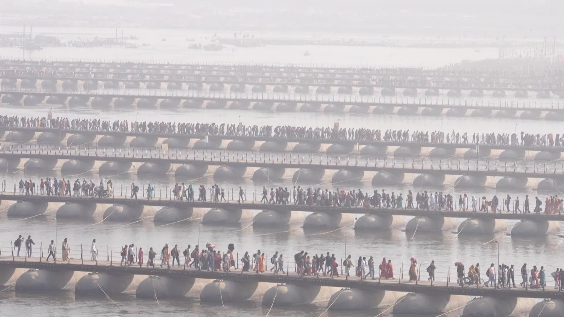Devotees crossing pontoon bridges at "Maha Kumbh Mela"