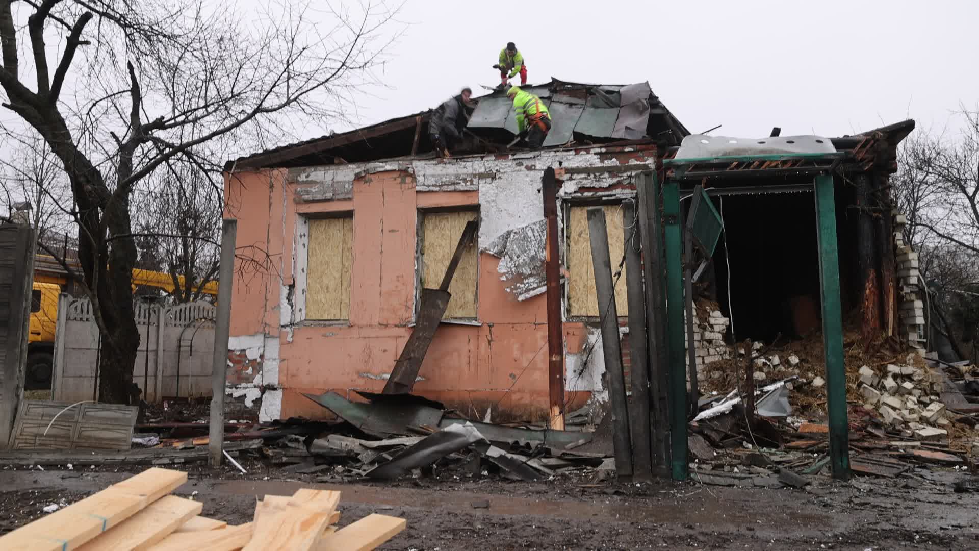russian drone strike to a private building in Kharkiv, Ukraine