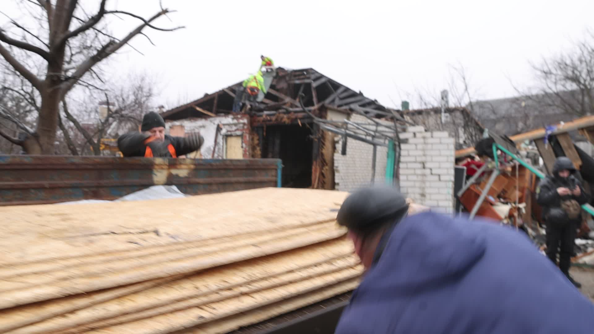 russian drone strike to a private building in Kharkiv, Ukraine