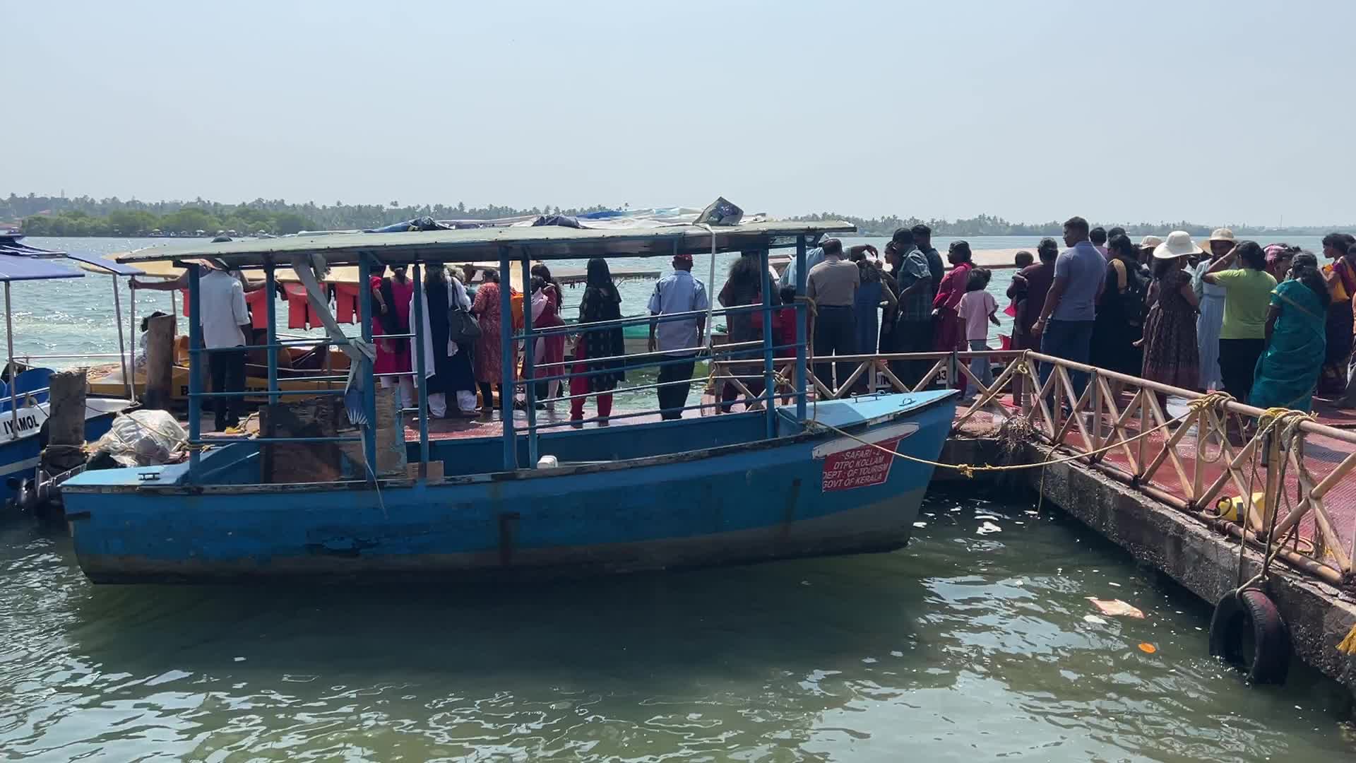 Indian tourists board boats to travel to Sambranikodi Island 