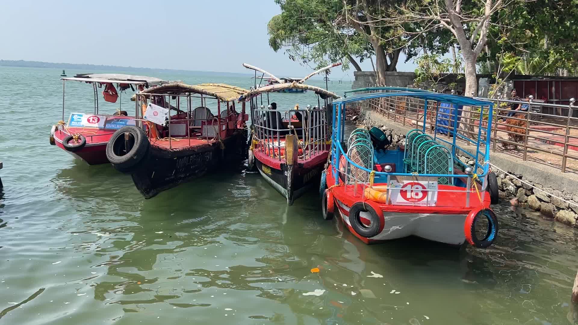 Indian tourists board boats to travel to Sambranikodi Island 