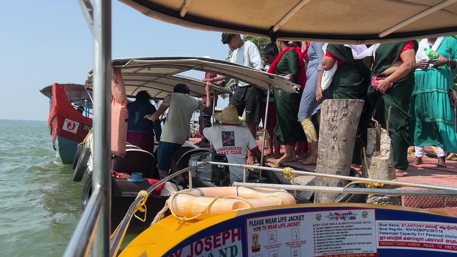 Indian tourists board boats to travel to Sambranikodi Island 