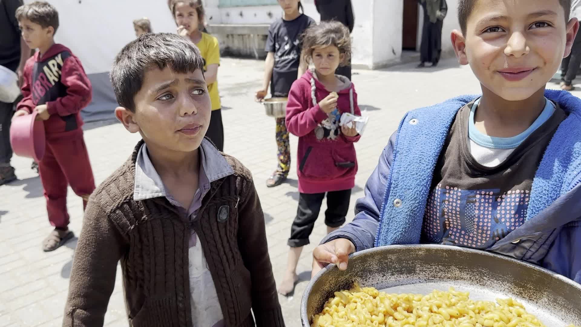 Displaced Palestinians Gather for Food at Charity Kitchen Amid Hamas-Israel Conflict