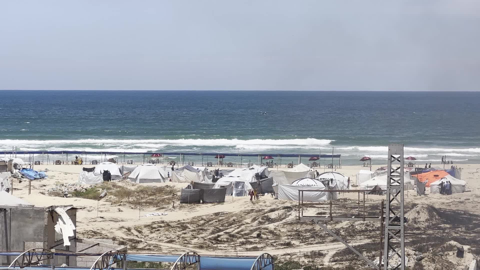 Palestinians Shelter in Tents at Gaza Port Amid Hamas-Israel Conflict