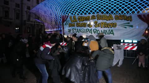 Flash mob protesting against Erdogan and the Rojava war in Milan