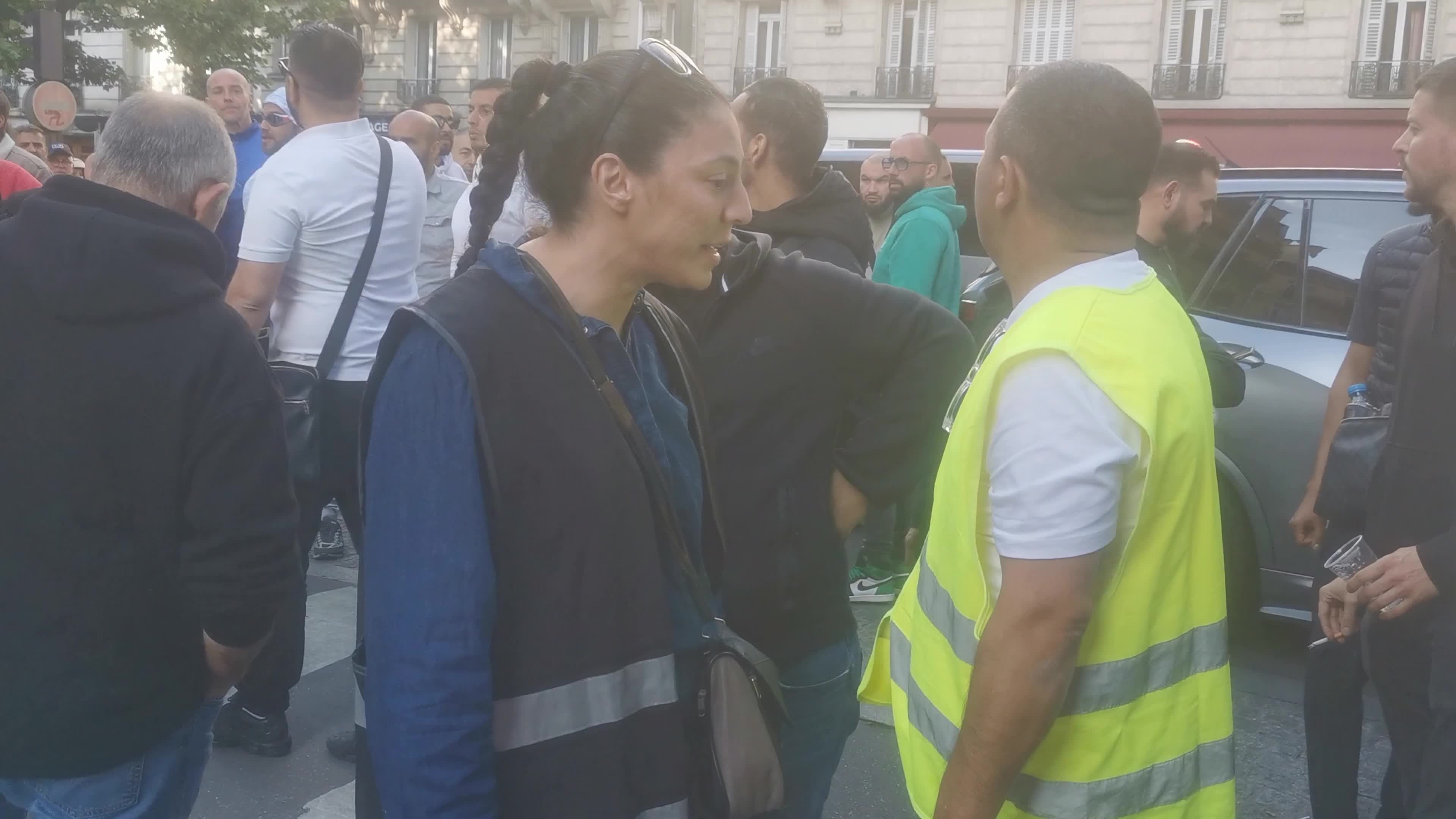 Hundreds of French taxi drivers gather in the street of Paris and block the Avenue Raspail near the Ministry of Transport