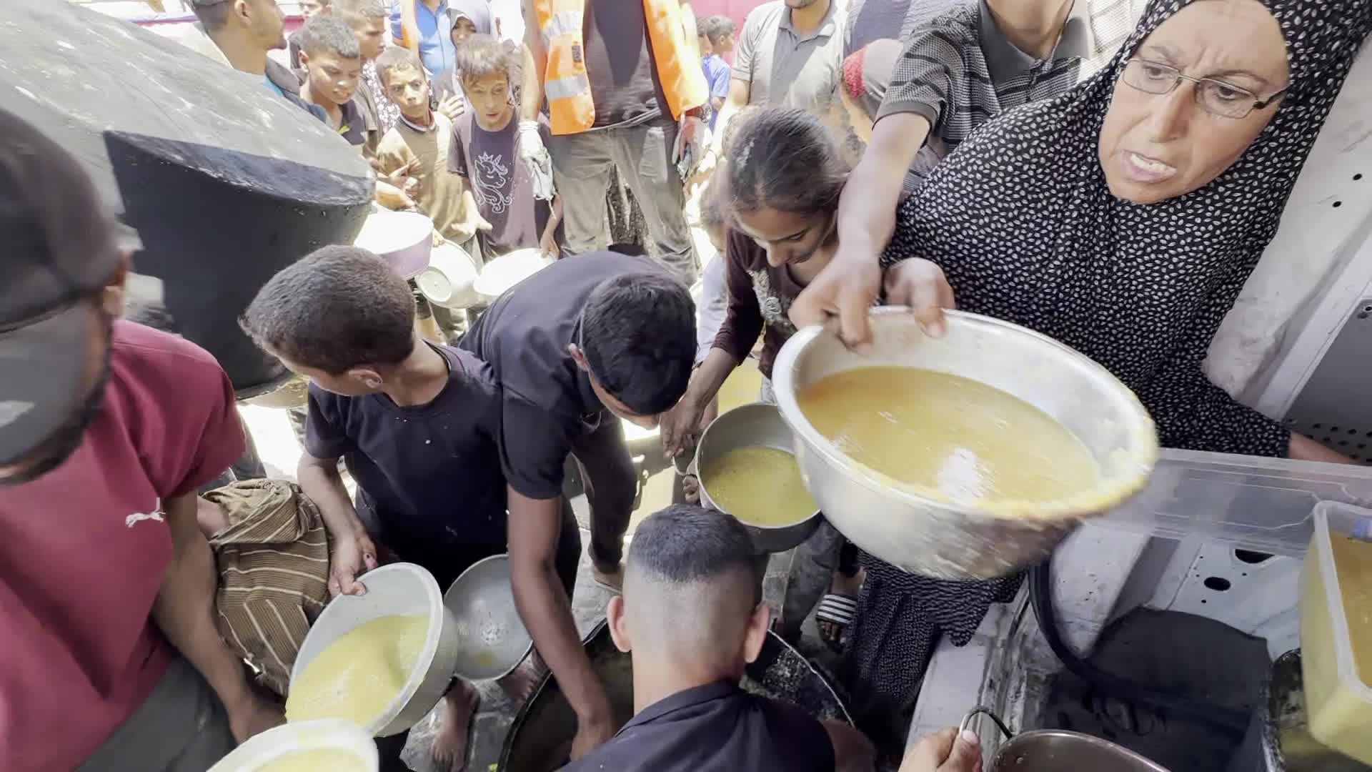 Palestinians Line Up for Hot Meals at Distribution Point in Gaza City