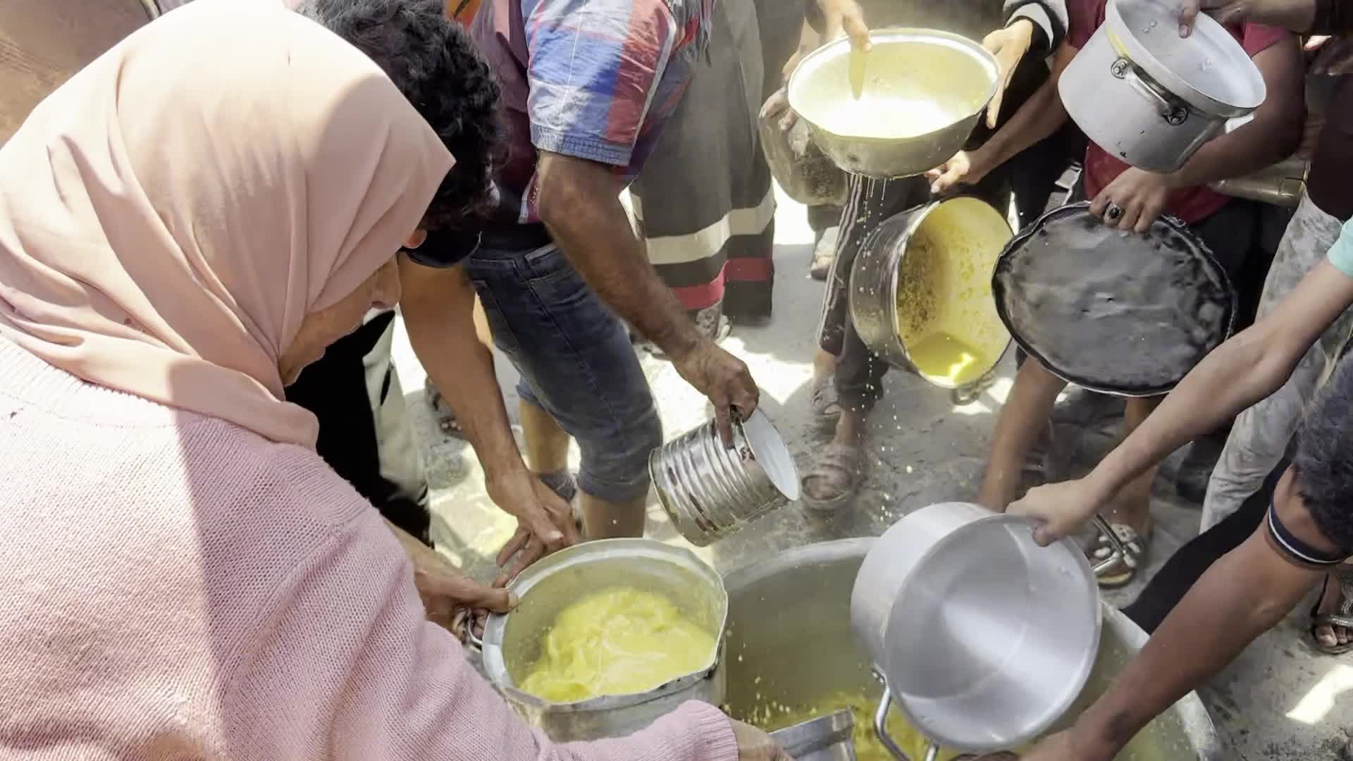 Palestinians Line Up for Hot Meals at Distribution Point in Gaza City