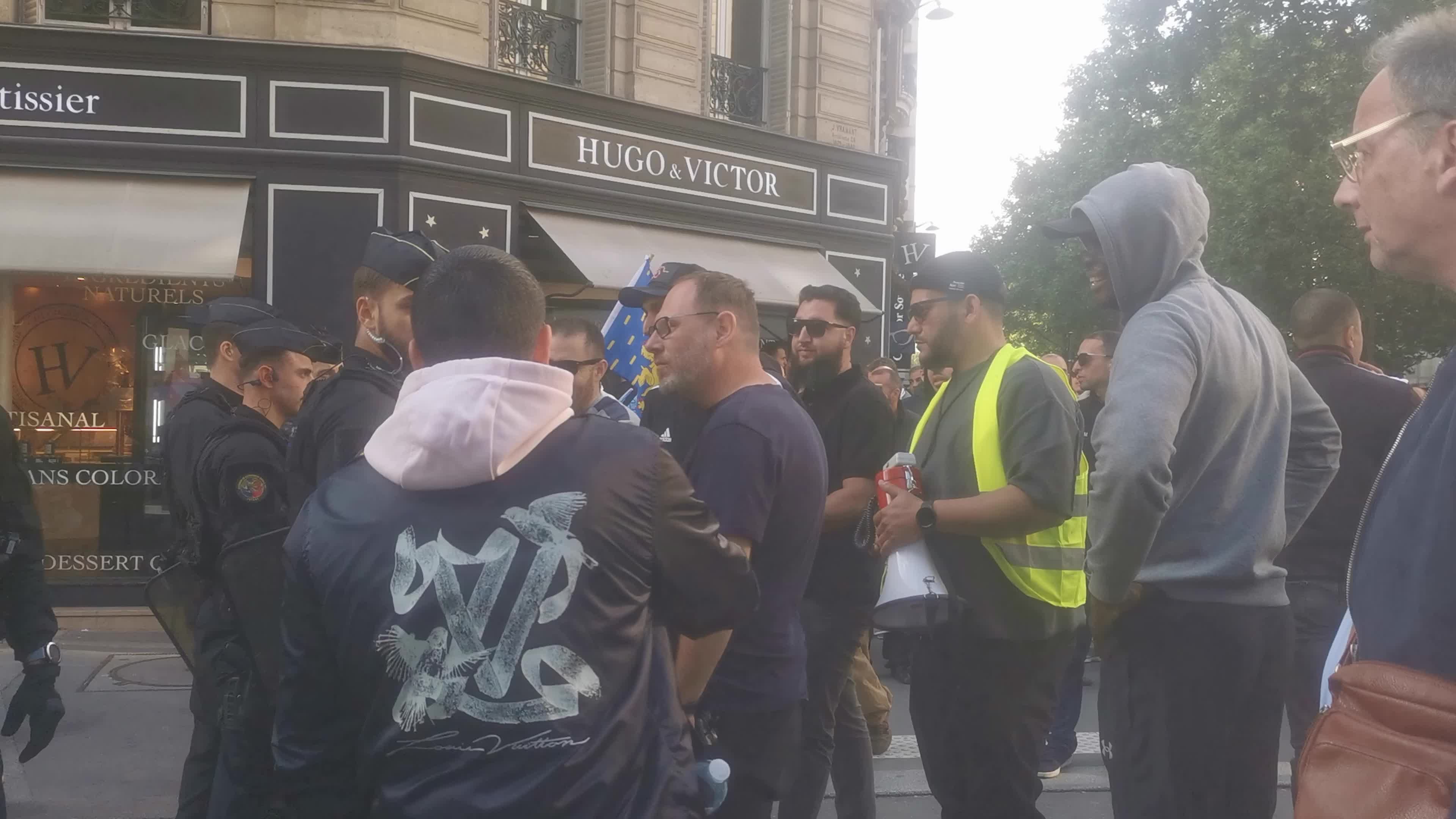 Hundreds of French taxi drivers gather in the street of Paris and block the Avenue Raspail near the Ministry of Transport