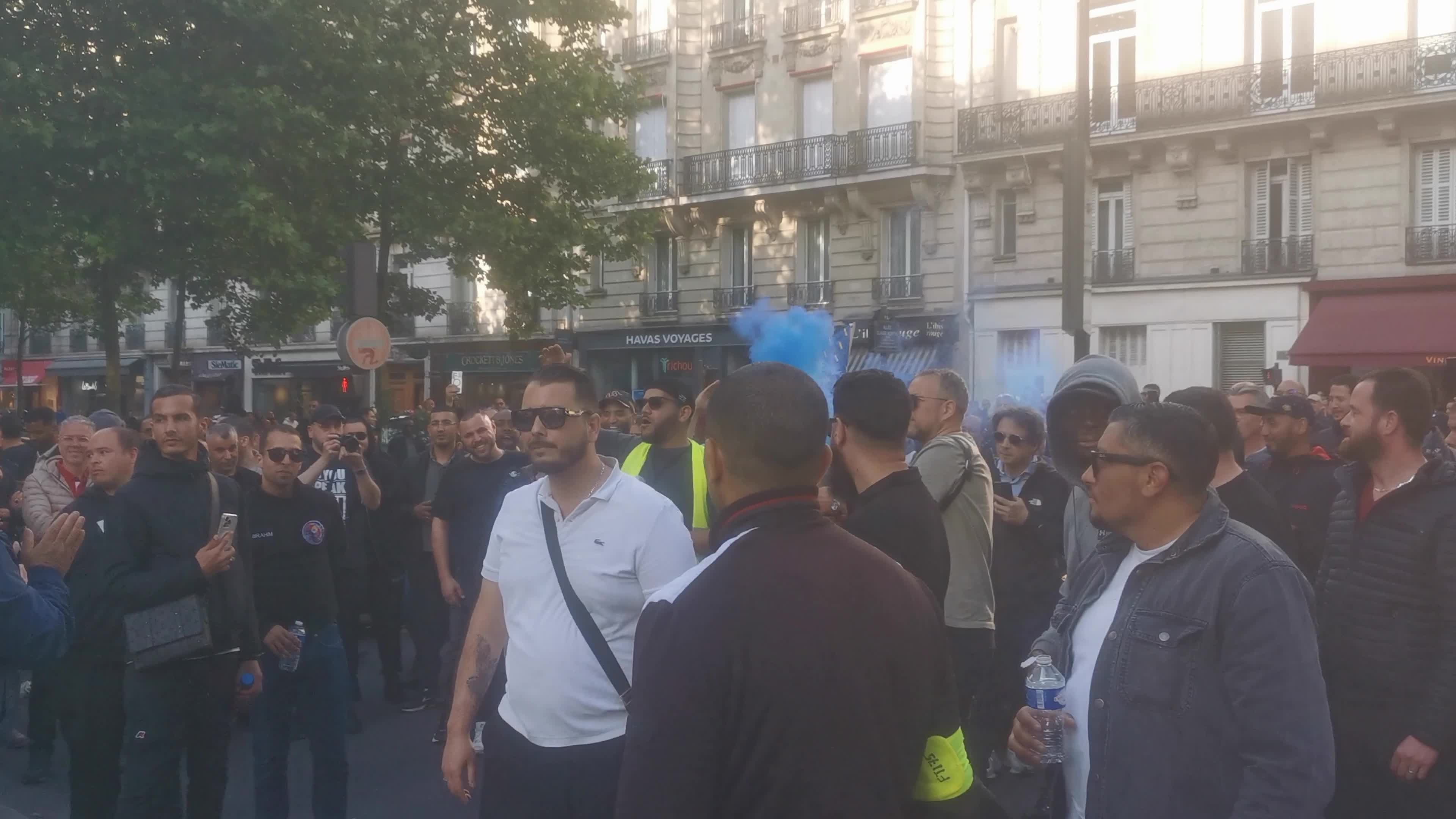 Hundreds of French taxi drivers gather in the street of Paris and block the Avenue Raspail near the Ministry of Transport