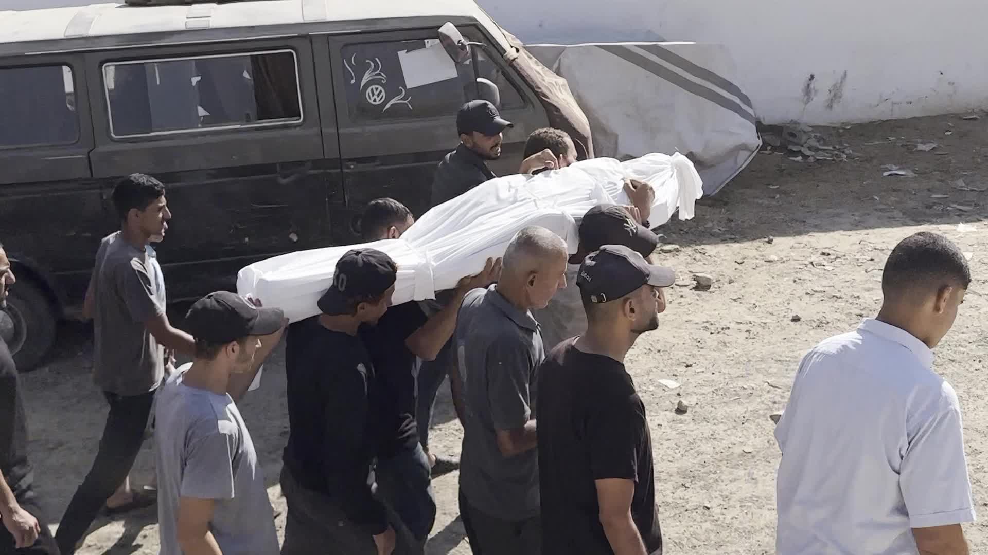 Relatives Mourn Palestinians Killed in Israeli Fire at Al-Shifa Hospital in Gaza City