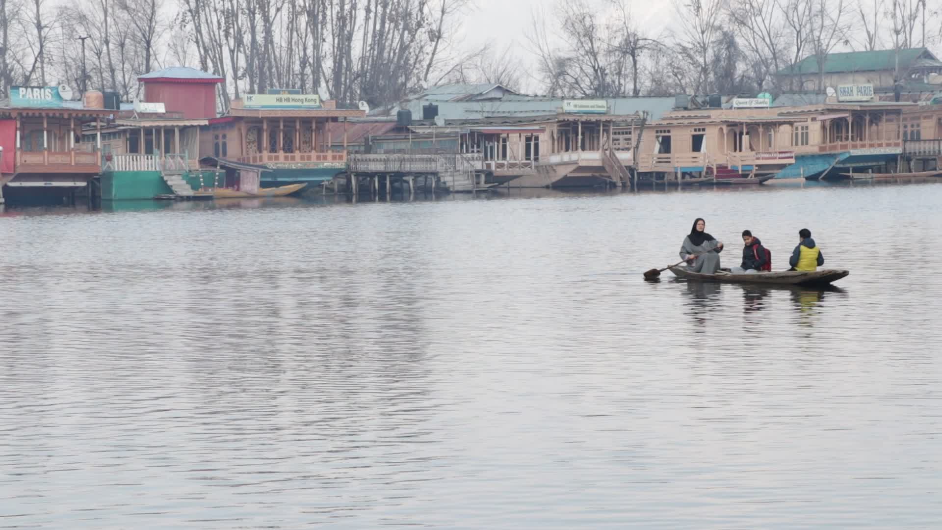 Dal Lake & snow-capped mountains
