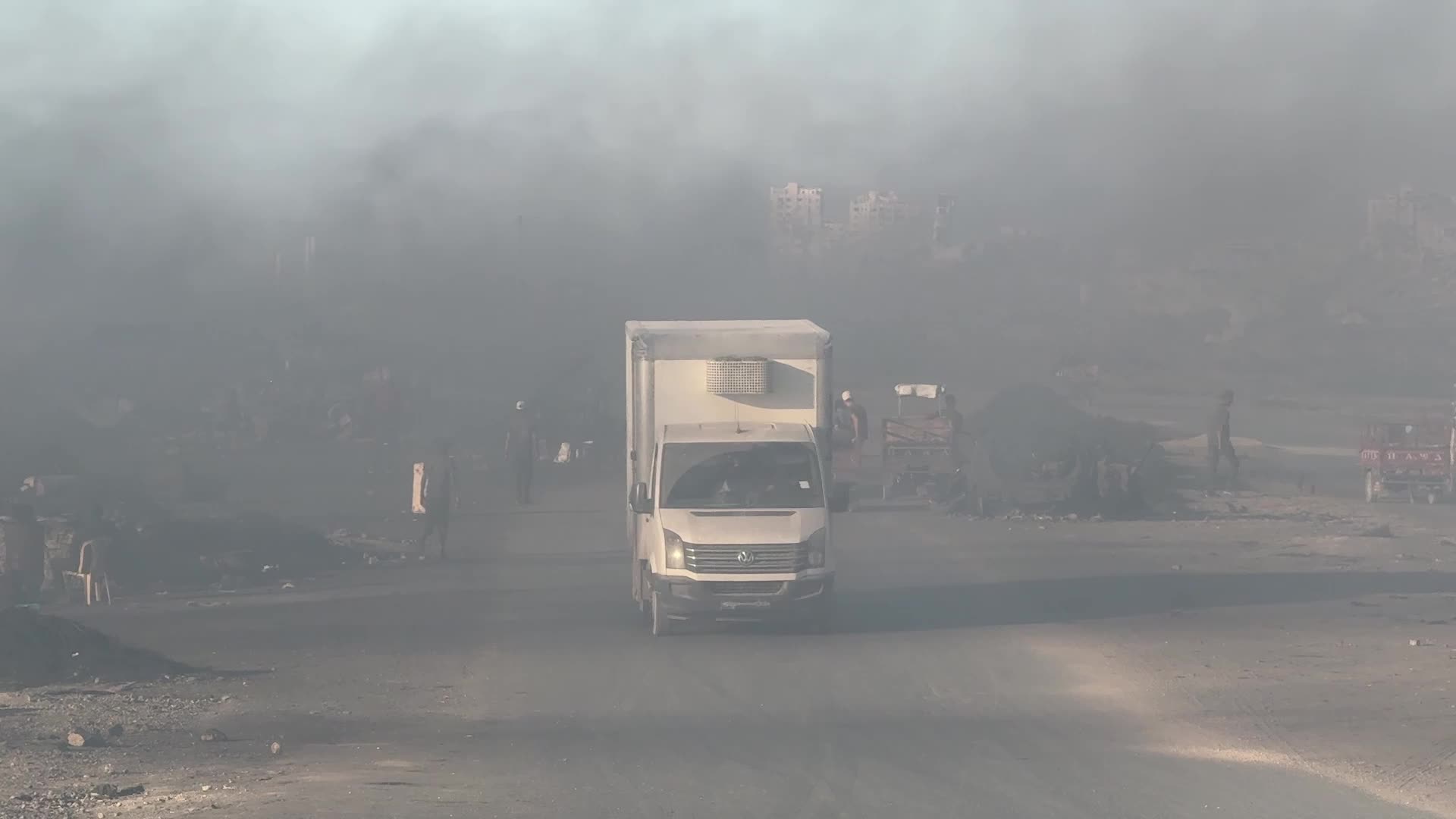 Displaced Palestinians Flee Gaza City Along Sea Road After Combat Zone Declaration