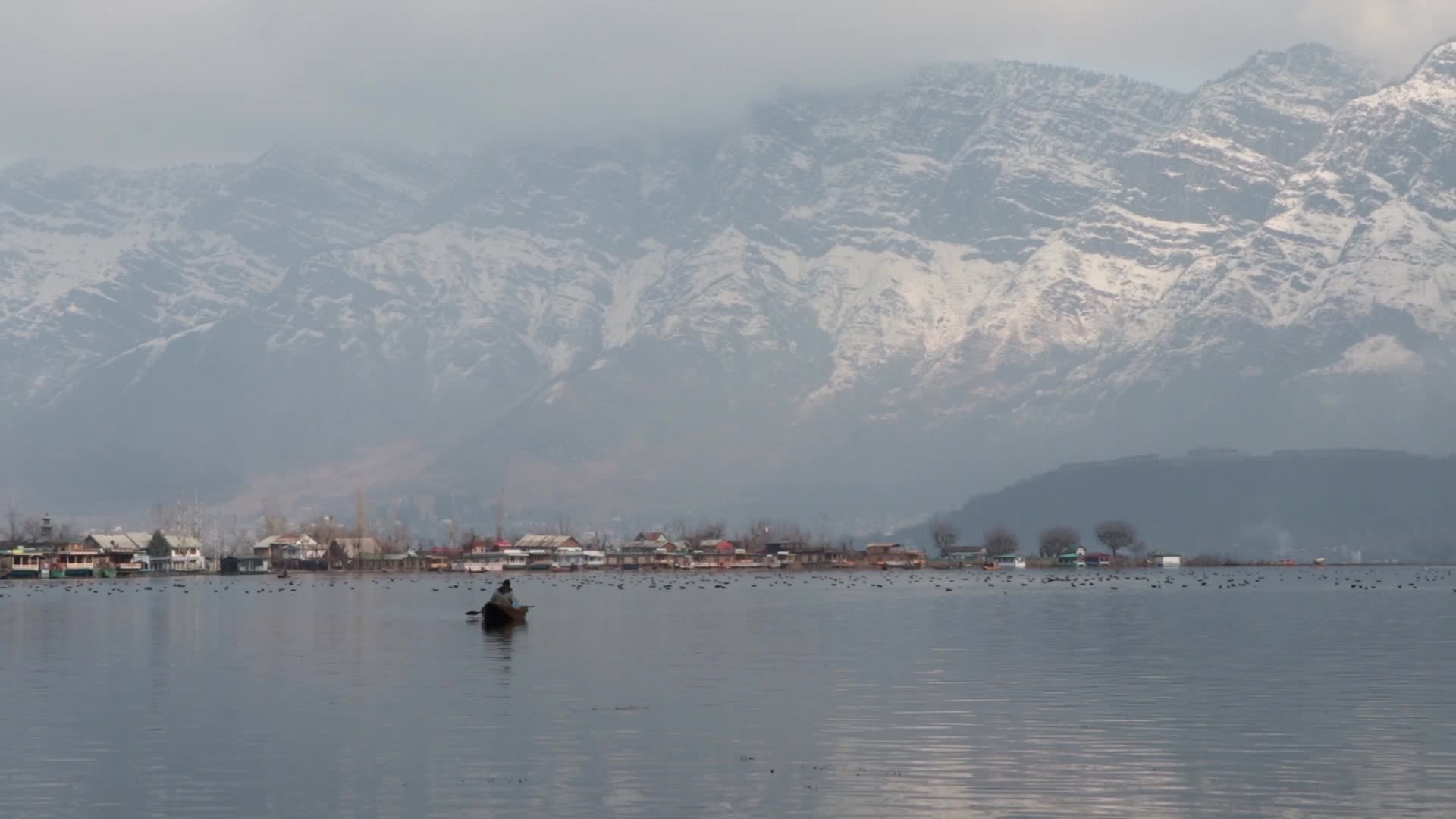 Dal Lake & snow-capped mountains
