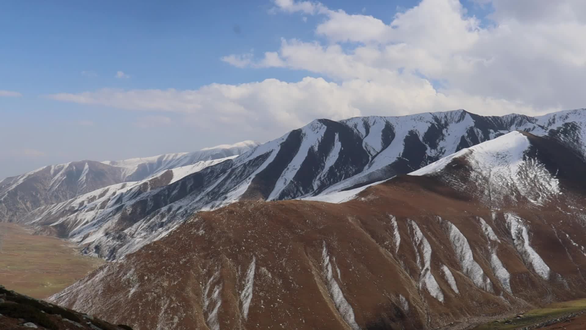 A view of snow-covered mountains in the Pir Panjal range of Poonch district