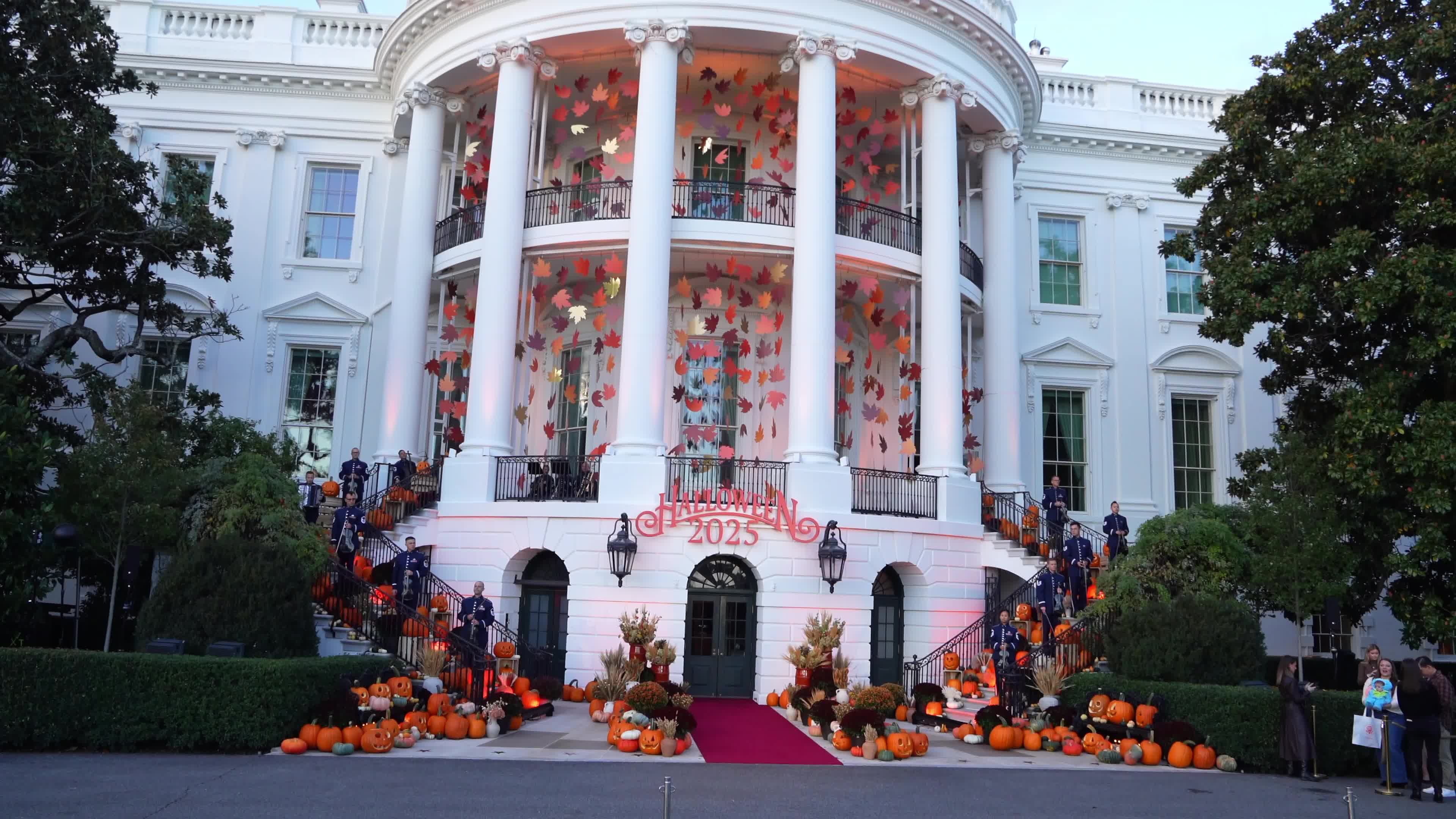 Melania Trump handout candy to children during the annual Halloween at the White House event
