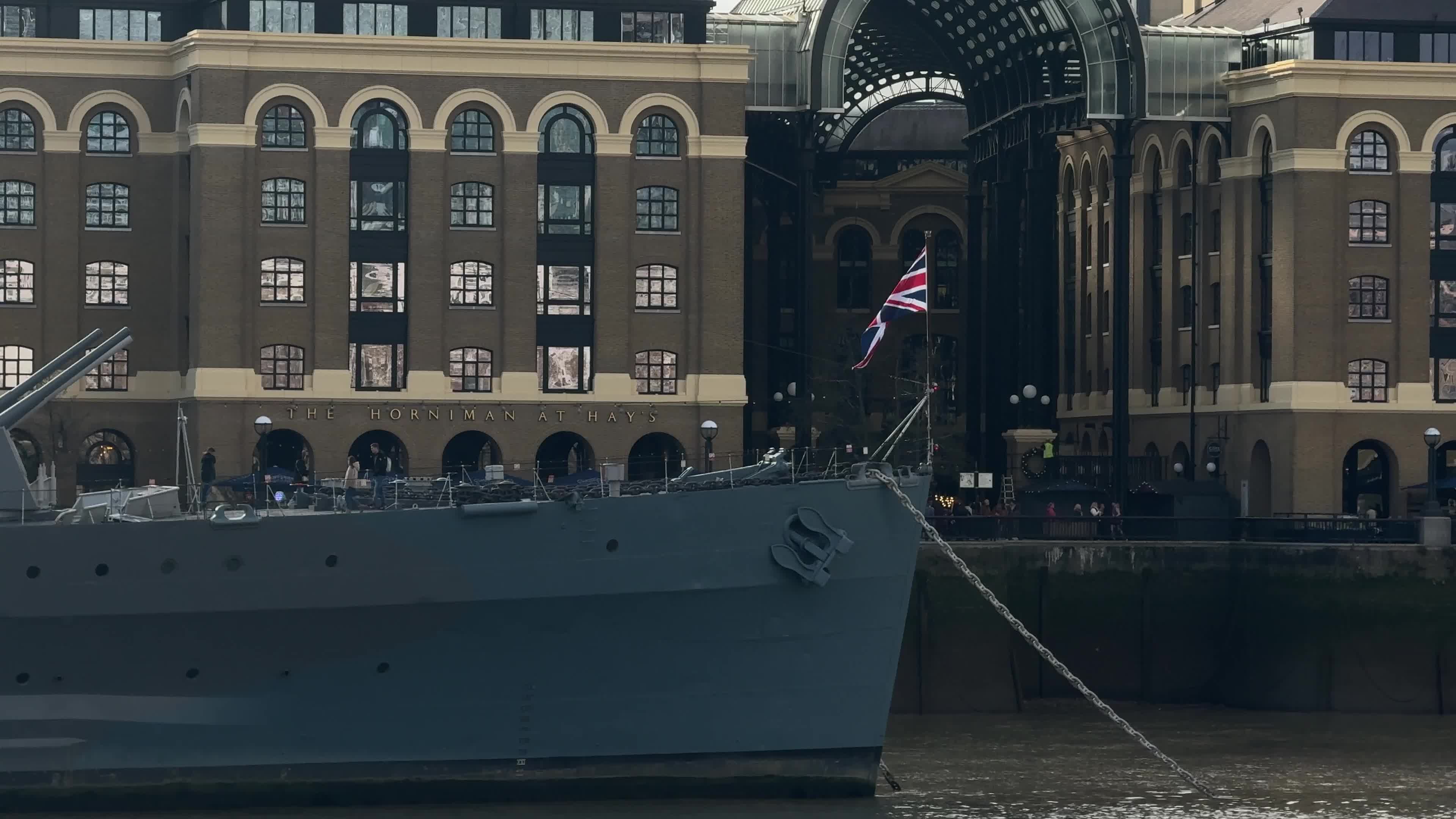 Union Jack waves on the HMS Belfast