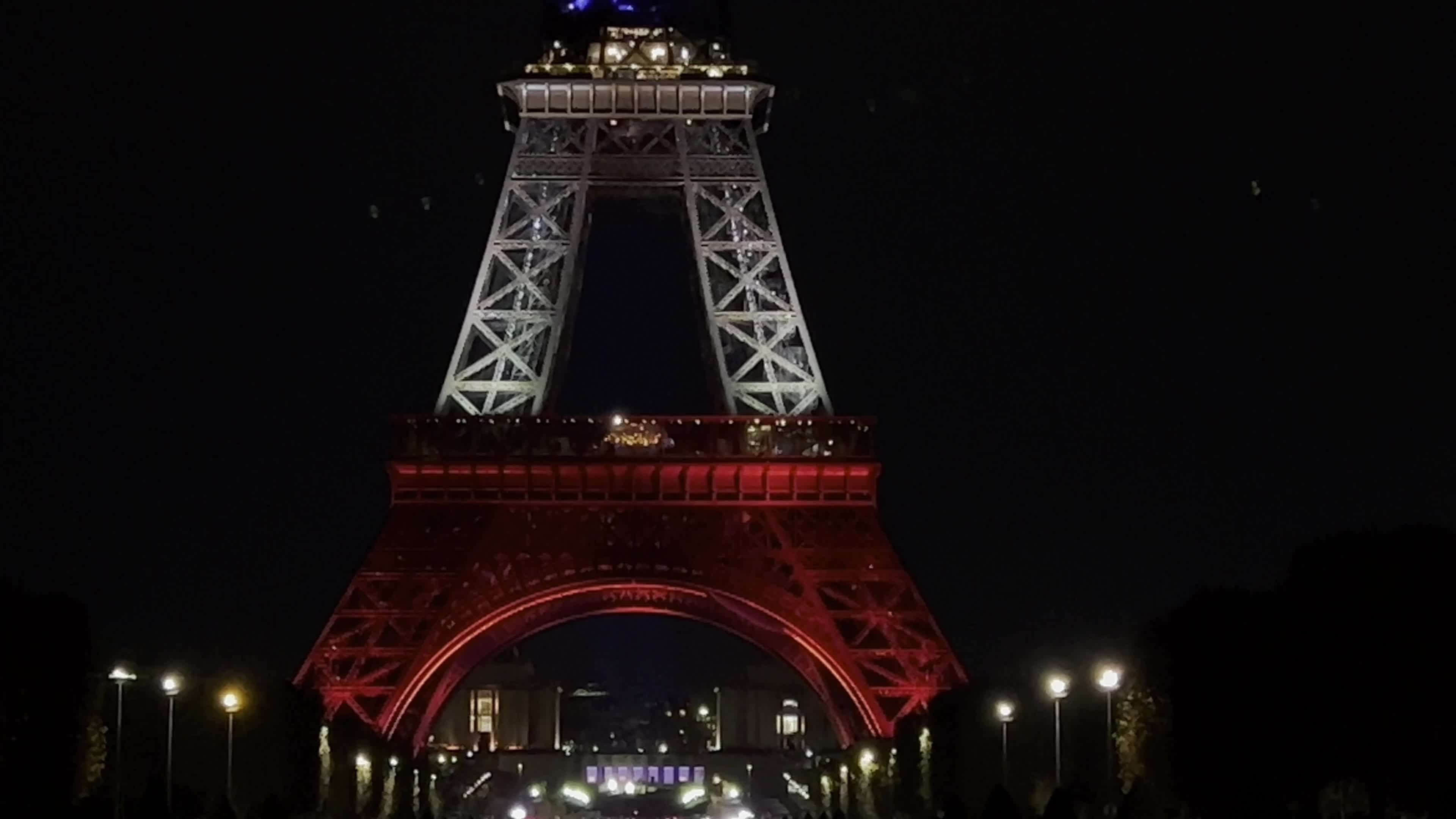 The Eiffel Tower illuminated in blue white and red to commemorate the victims of the terrorist attacks of November 13, 2015