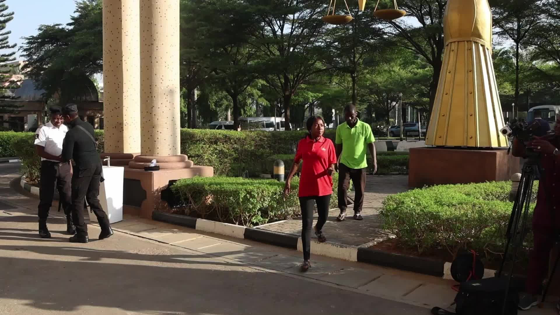 Court workers seen on arrival at the Federal High court in Abuja