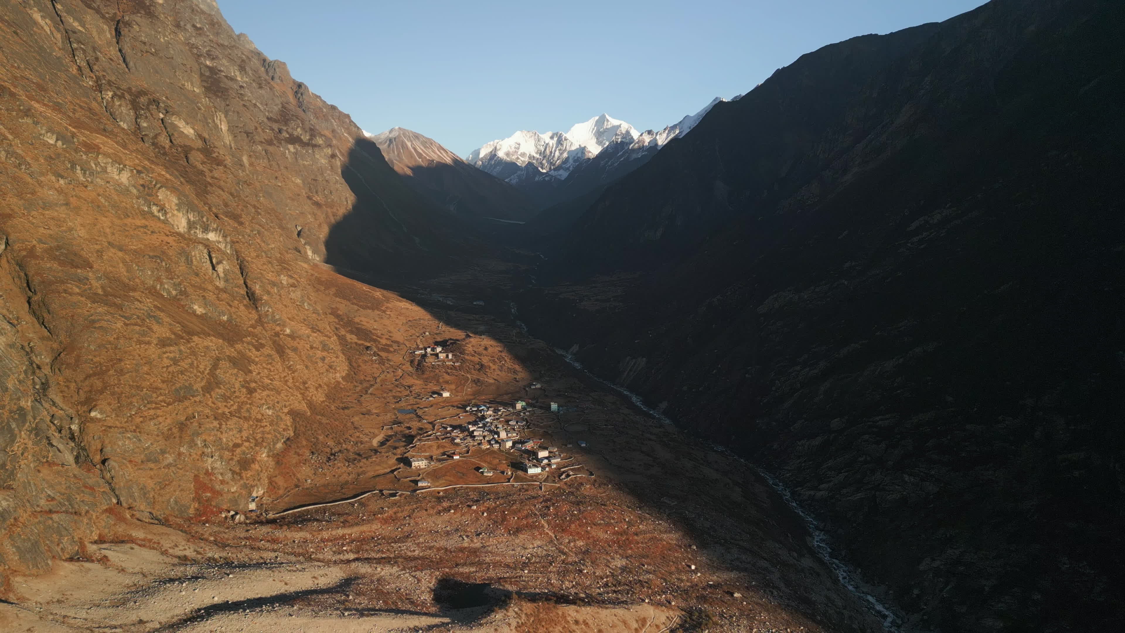 Langtang Village in a Sunset Mountain Valley