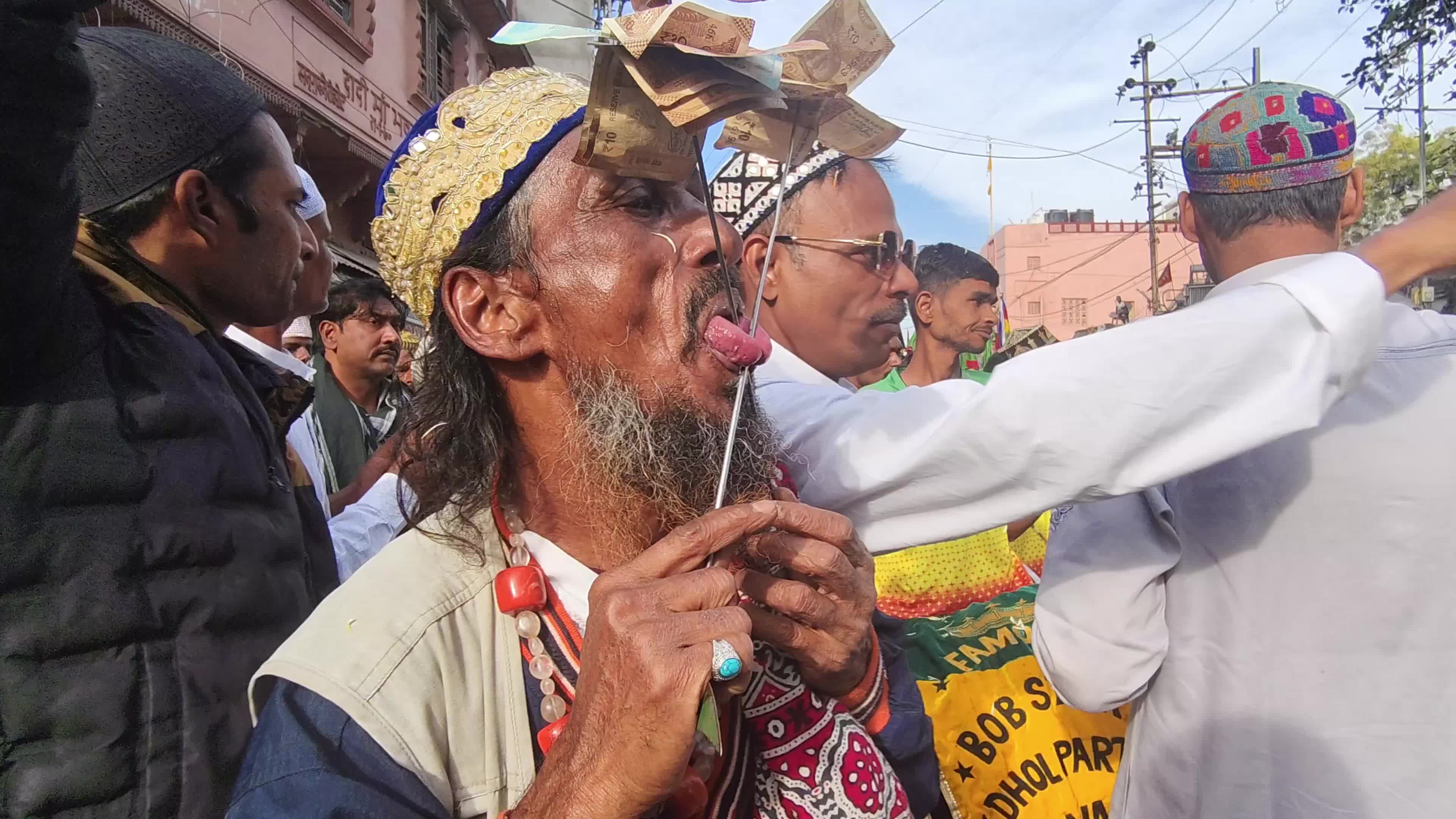 Muslim devotees take part in a religious procession during the annual "URS" Festival at the Shrine of Sufi Sant Hazrat Khwaja Moinuddin Chishti in Ajmer 