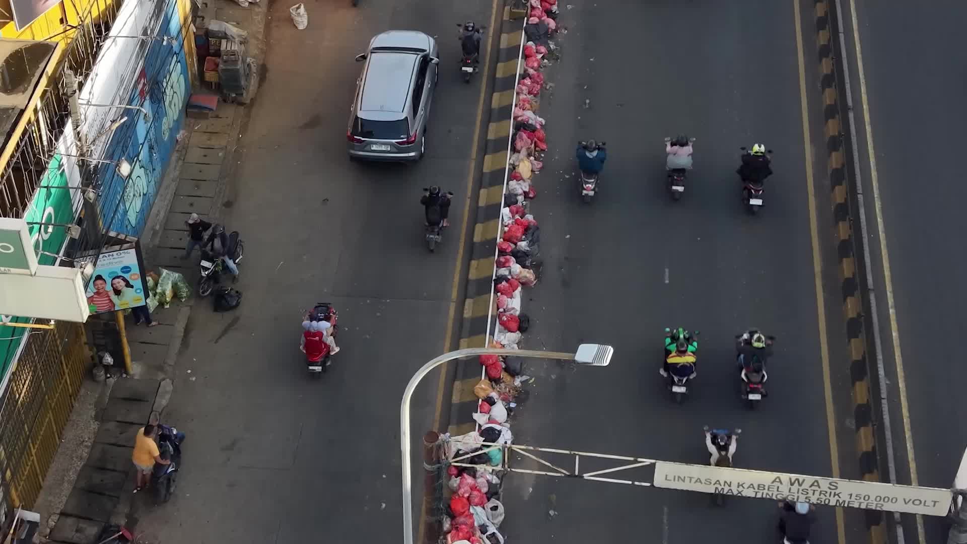 Pile of garbages hit Indonesia