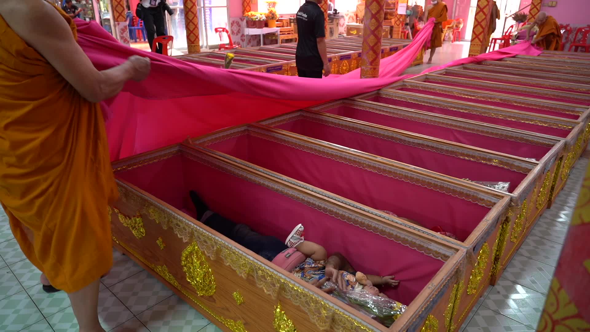 Thai People Lie In Coffins To Welcome The New Year.