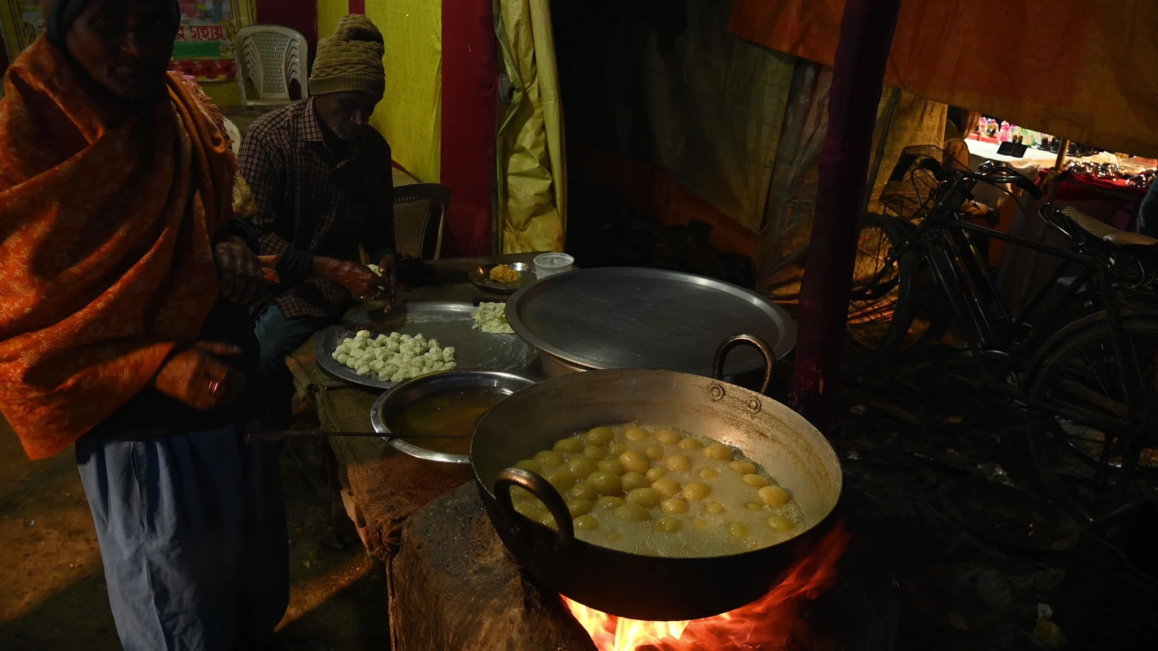 Rosogolla Making at the village fair - Indian sweets (mithai)