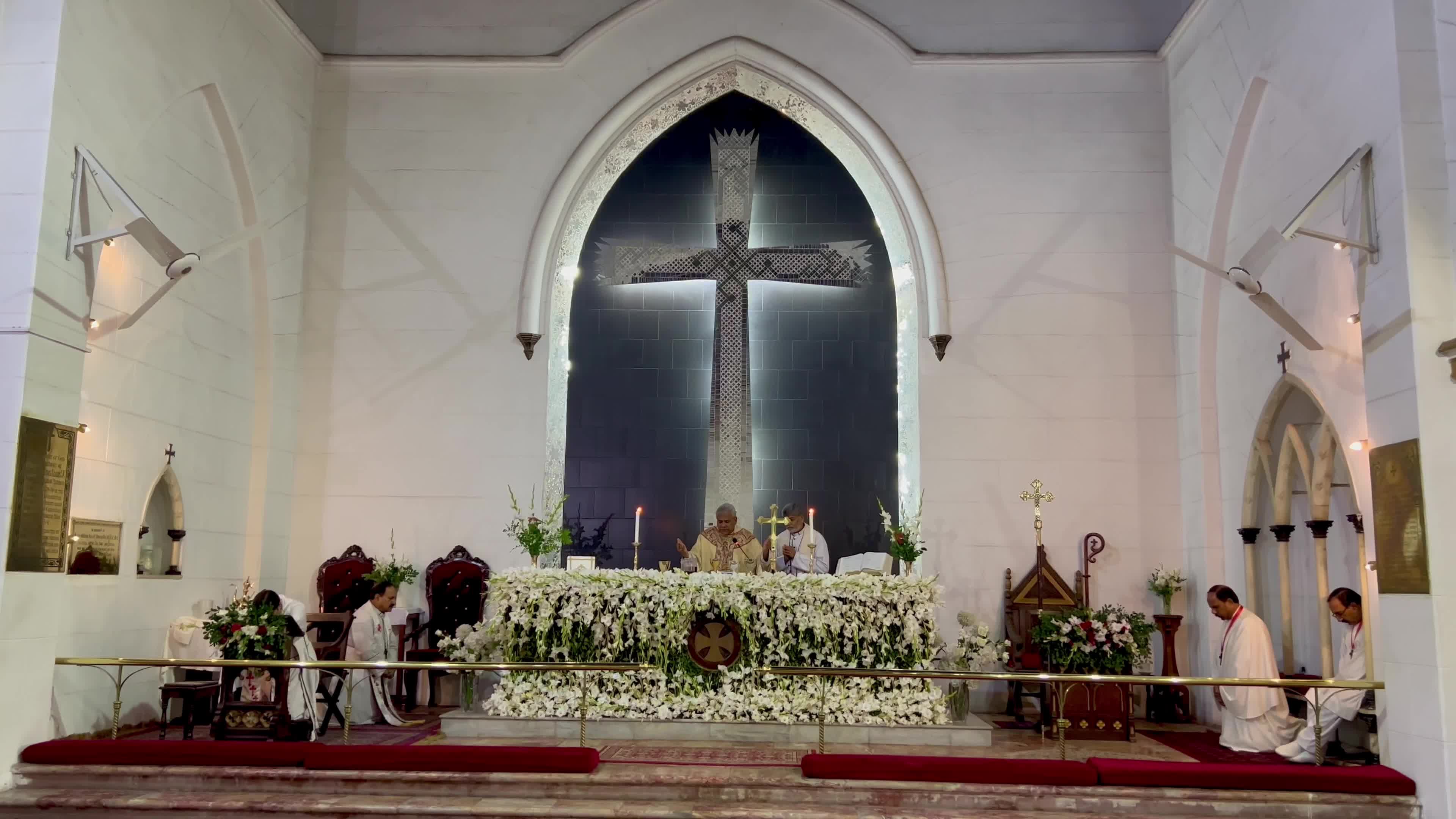 People pray as they attend a New Year service at the St. John's Cathedral in Peshawar 