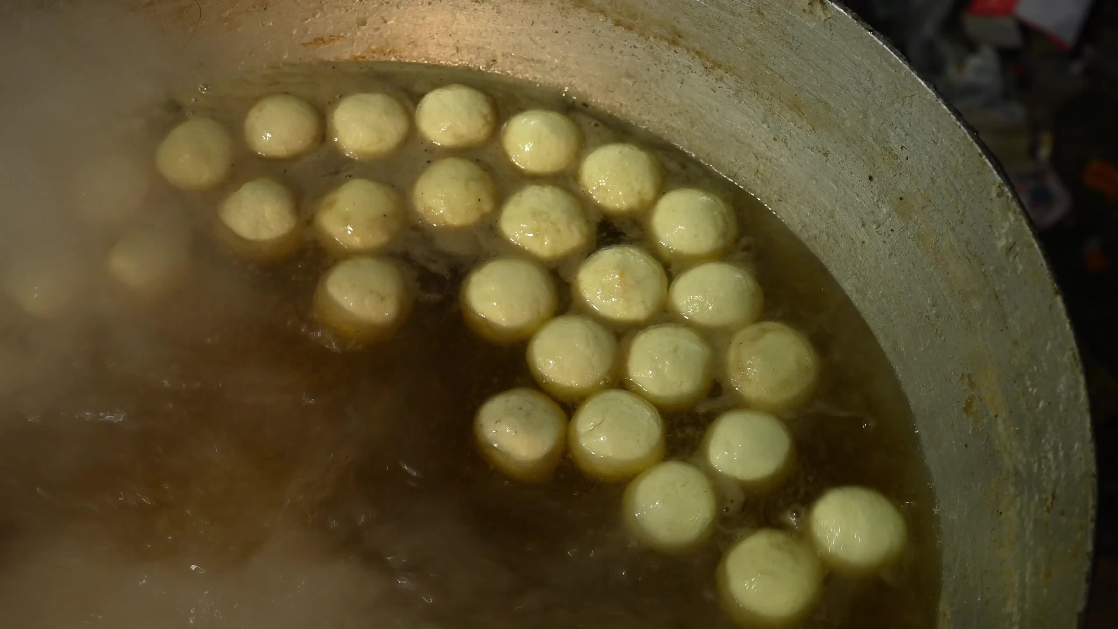 Rosogolla Making at the village fair - Indian sweets (mithai)