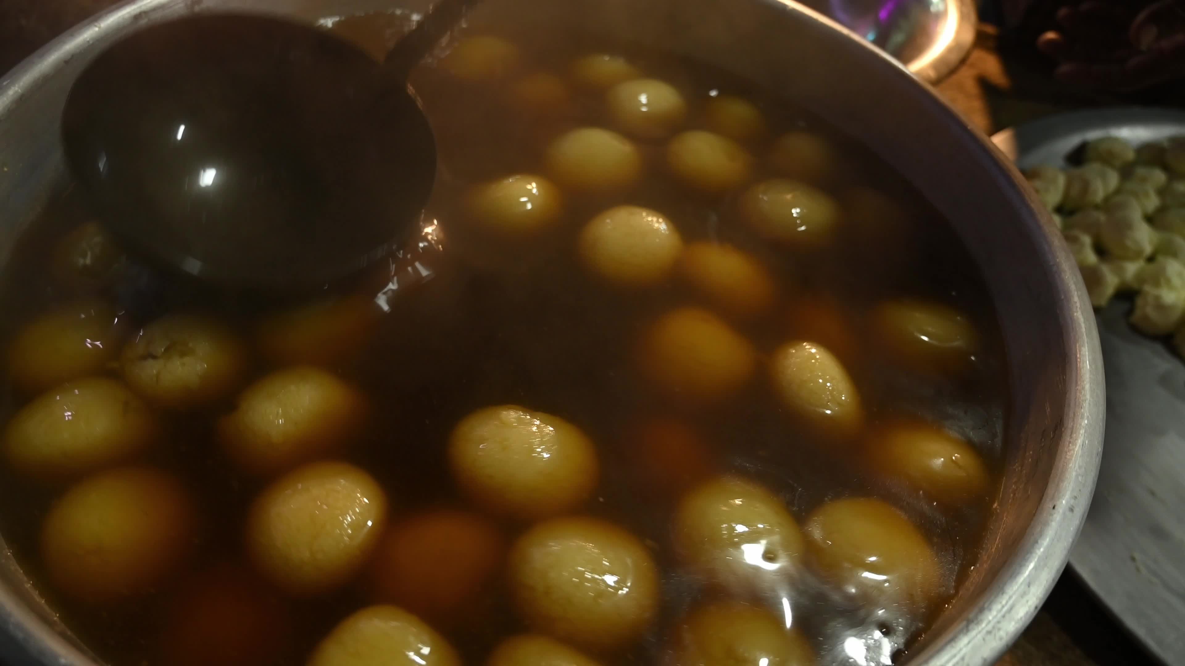 Rosogolla Making at the village fair - Indian sweets (mithai)