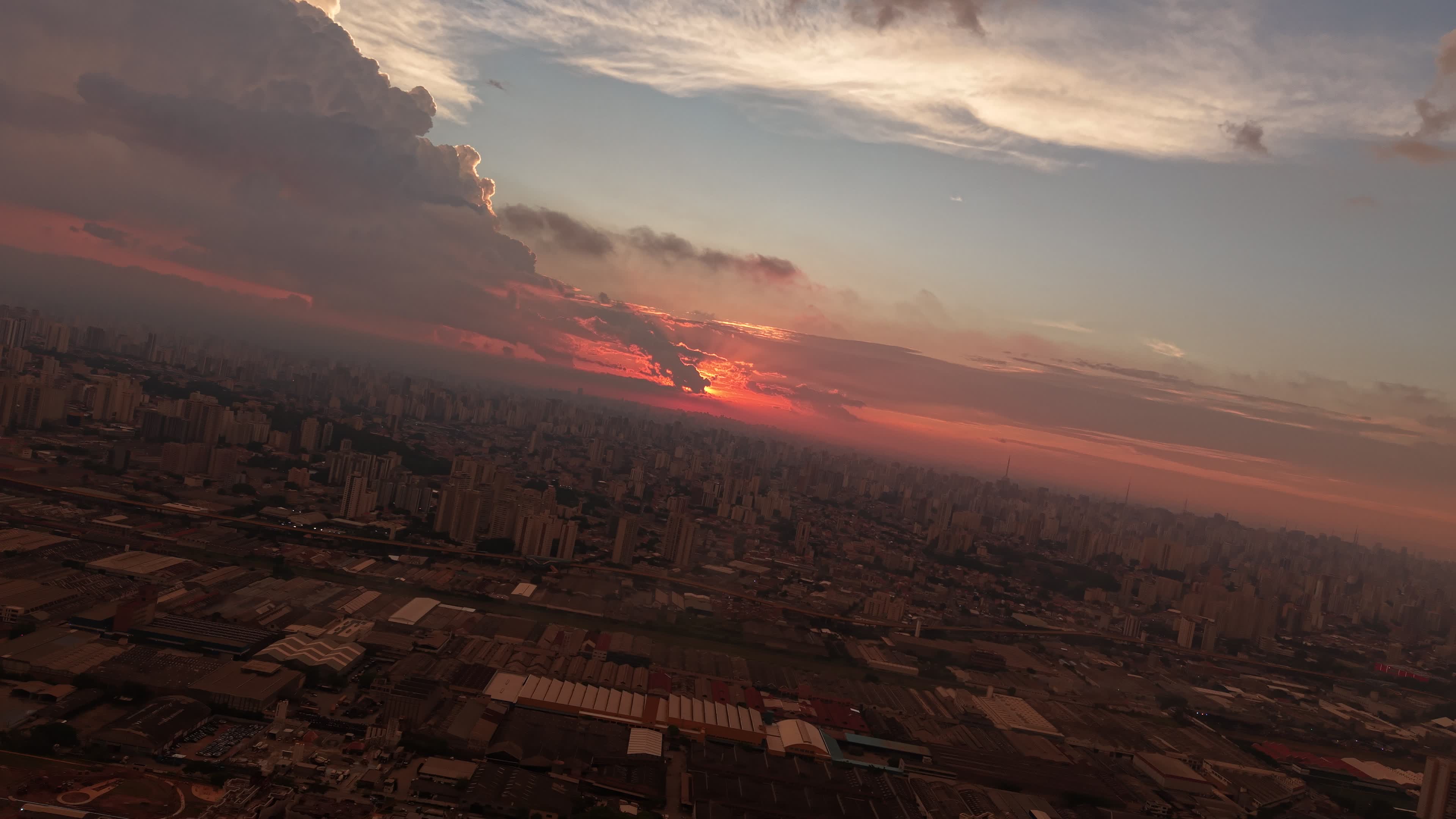 Aerial image shows the sunset in the city of São Paulo, Brazil.