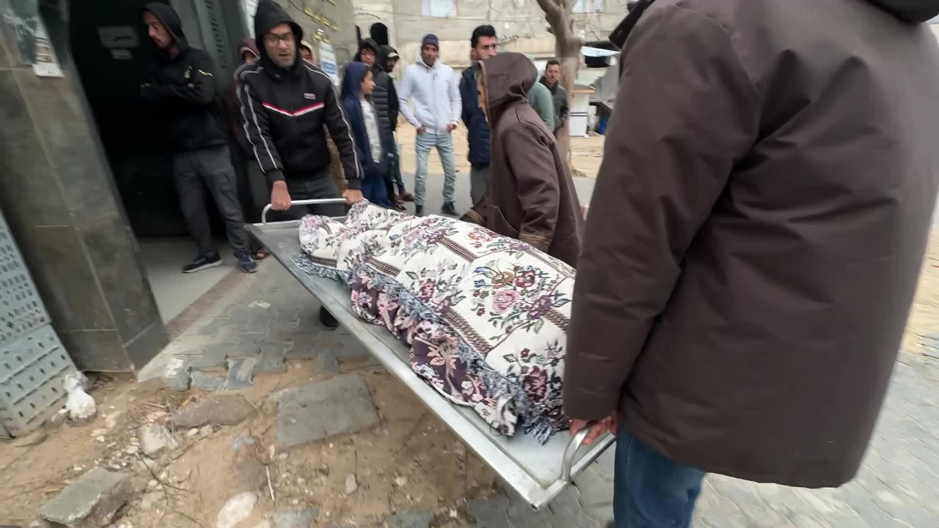 Palestinians Mourn Victims of Building Collapse in Gaza City