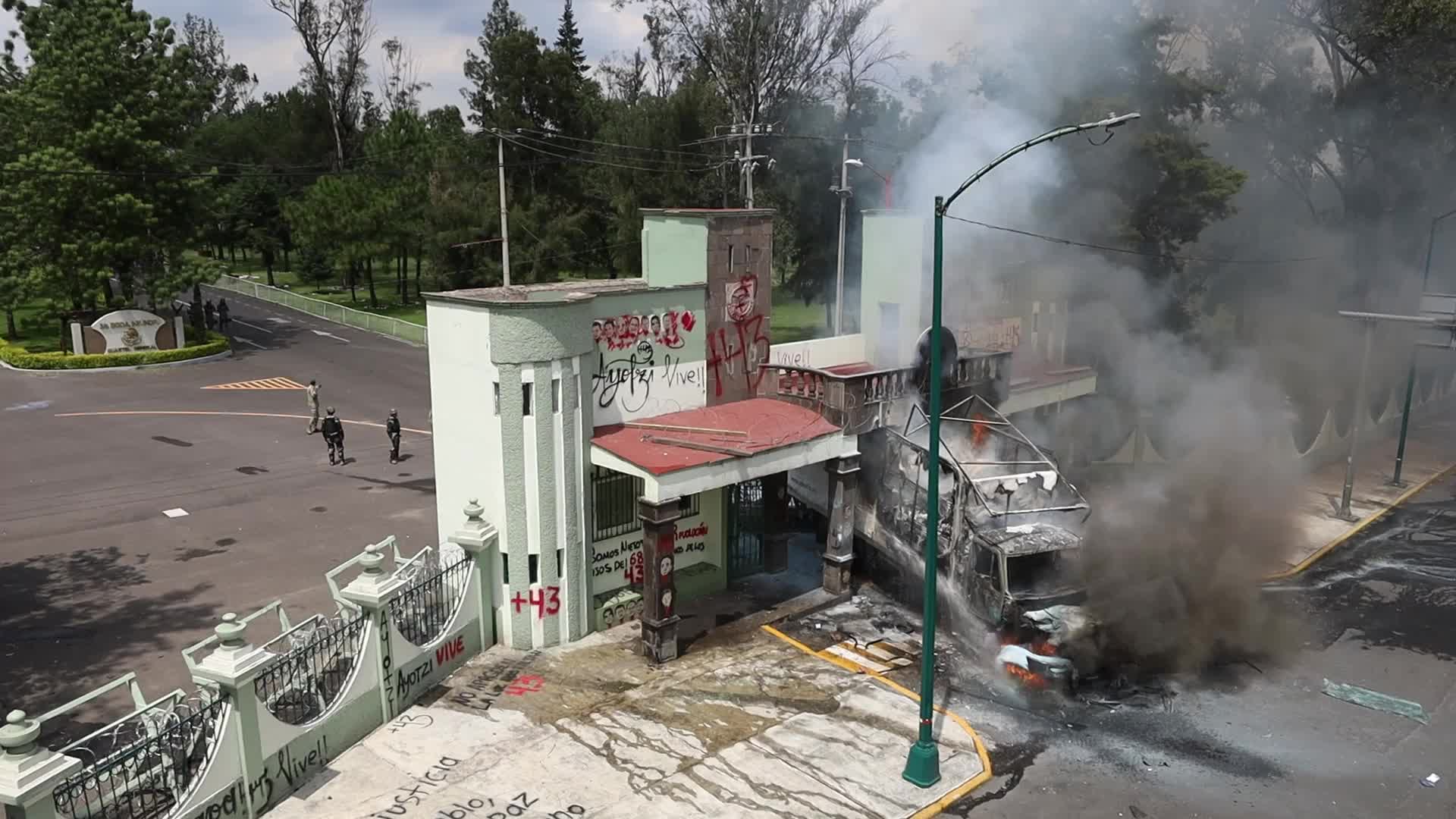 Friends and family members of the 43 missing students from Ayotzinapa held a protest at Military Camp No. 1-A.