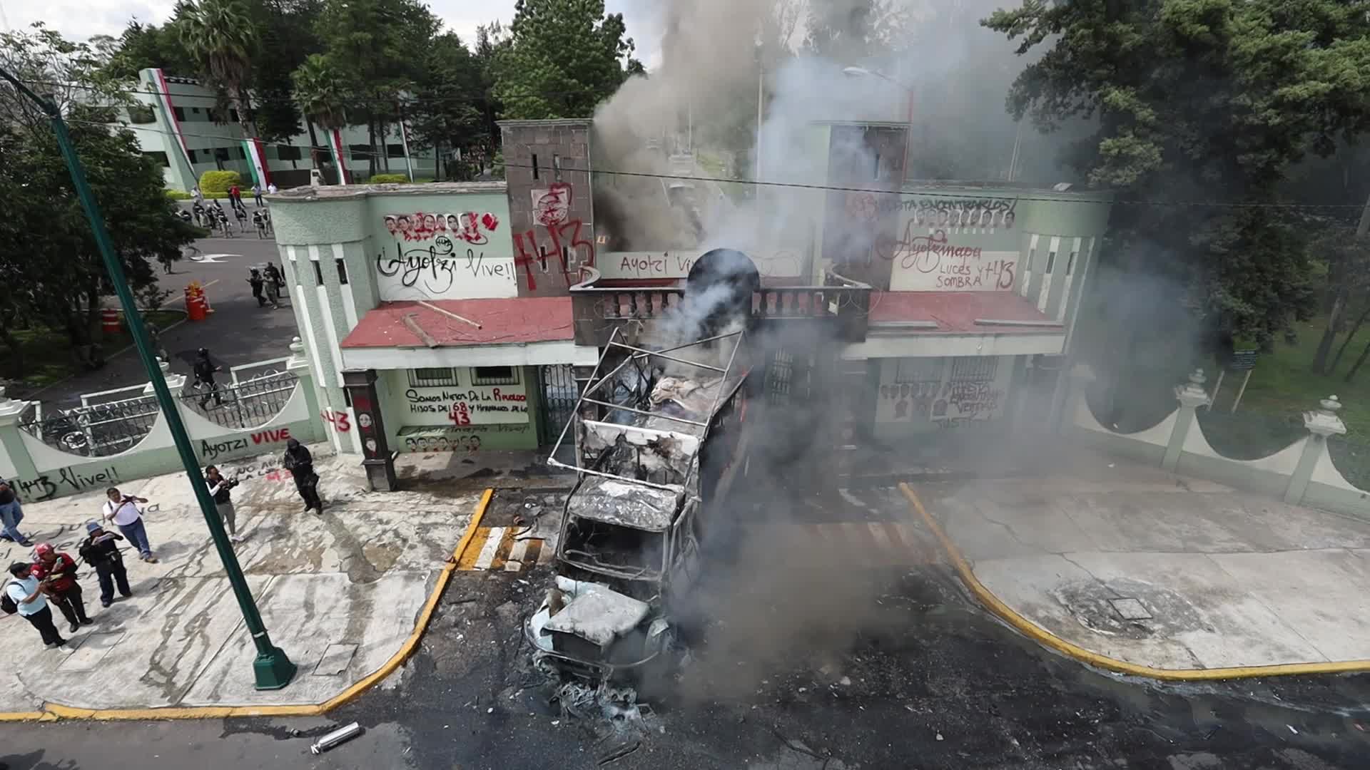 Friends and family members of the 43 missing students from Ayotzinapa held a protest at Military Camp No. 1-A.