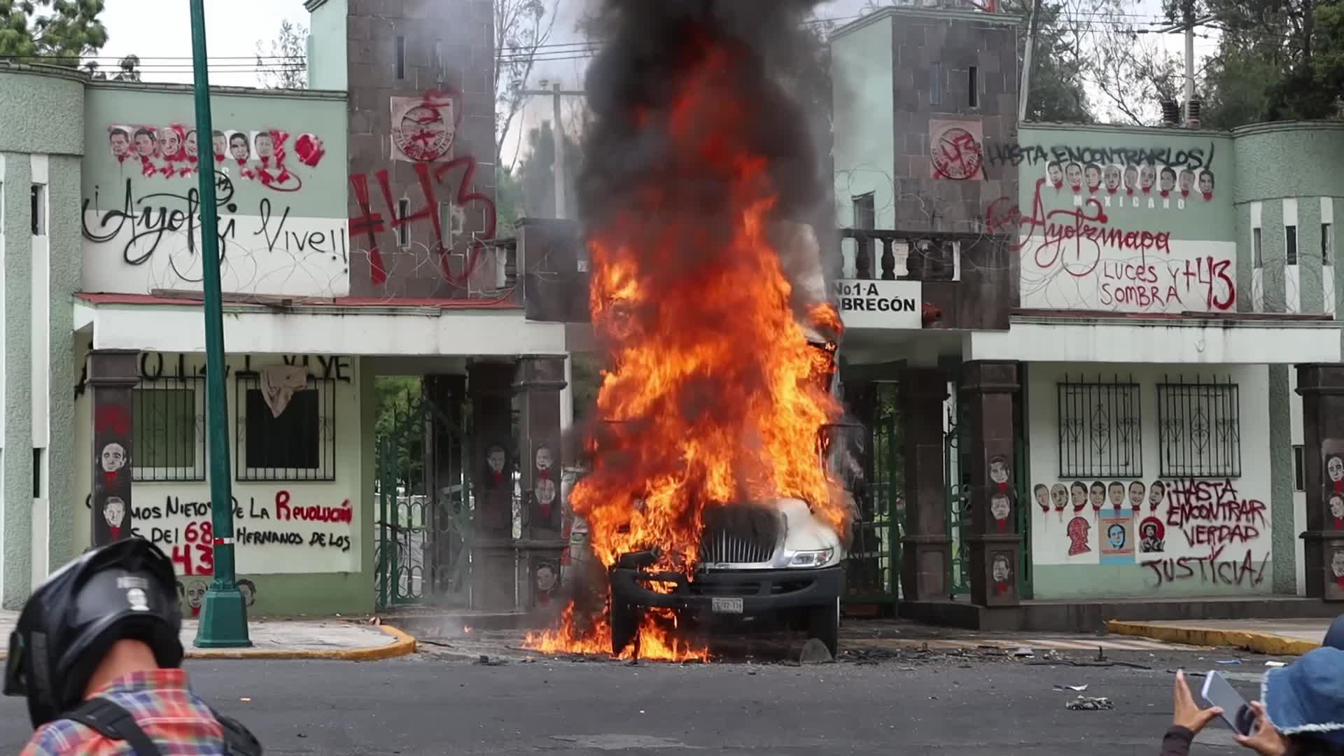 Friends and family members of the 43 missing students from Ayotzinapa held a protest at Military Camp No. 1-A.