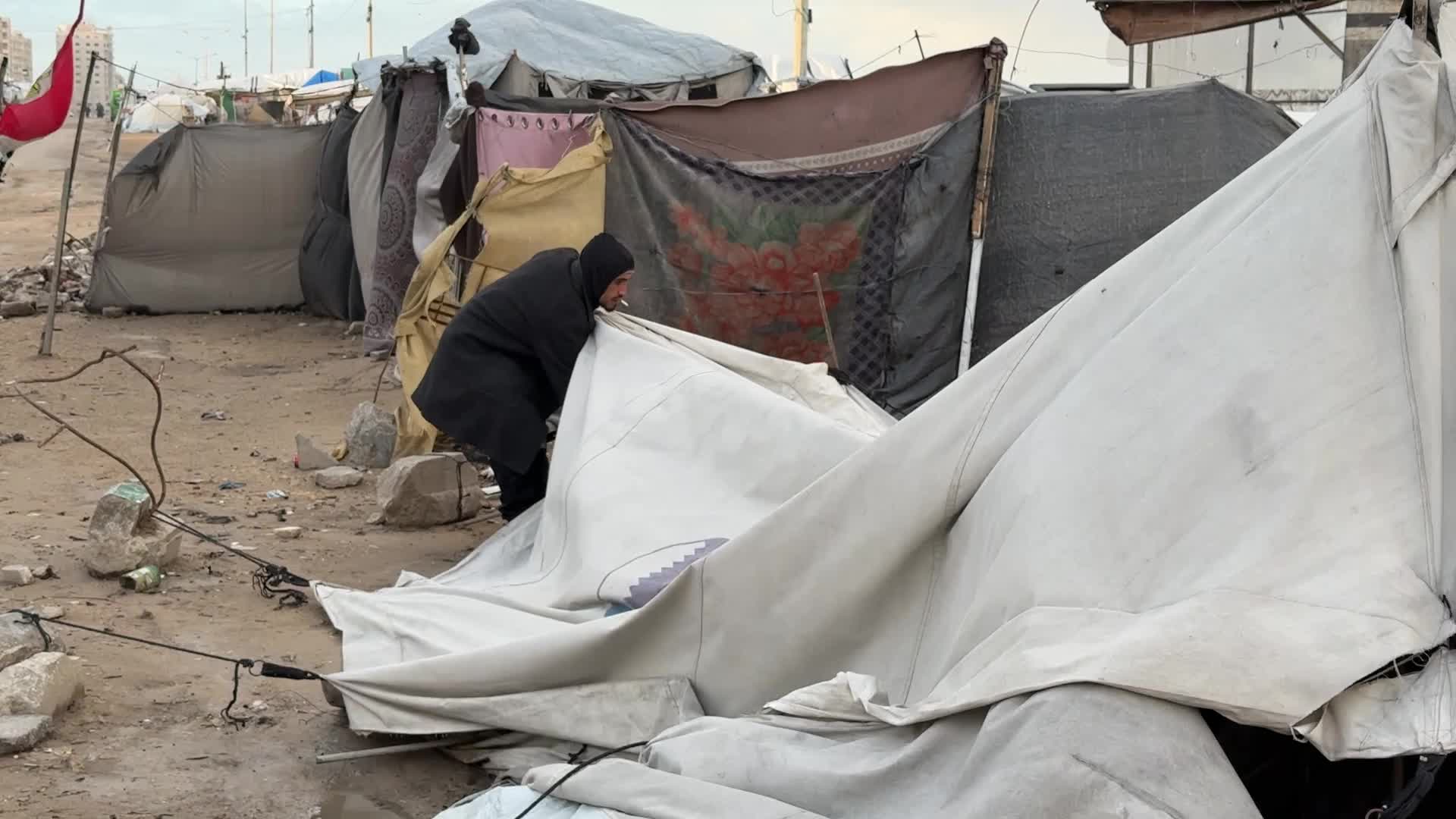 Tent Shelters Line Gaza City Shore Amid Winter Winds