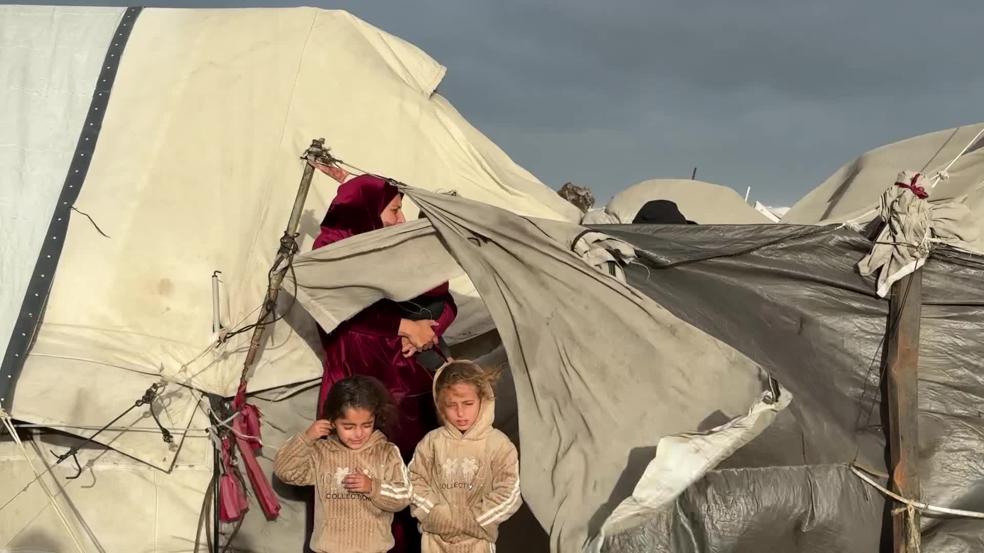 Tent Shelters Line Gaza City Shore Amid Winter Winds