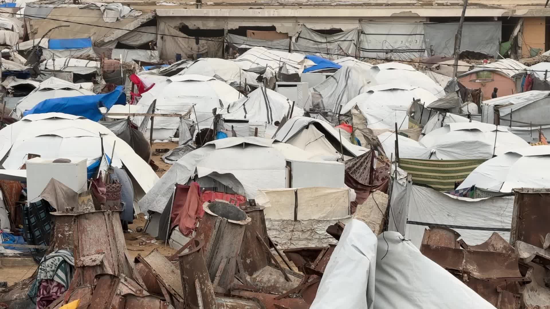Tent Shelters Line Gaza City Shore Amid Winter Winds