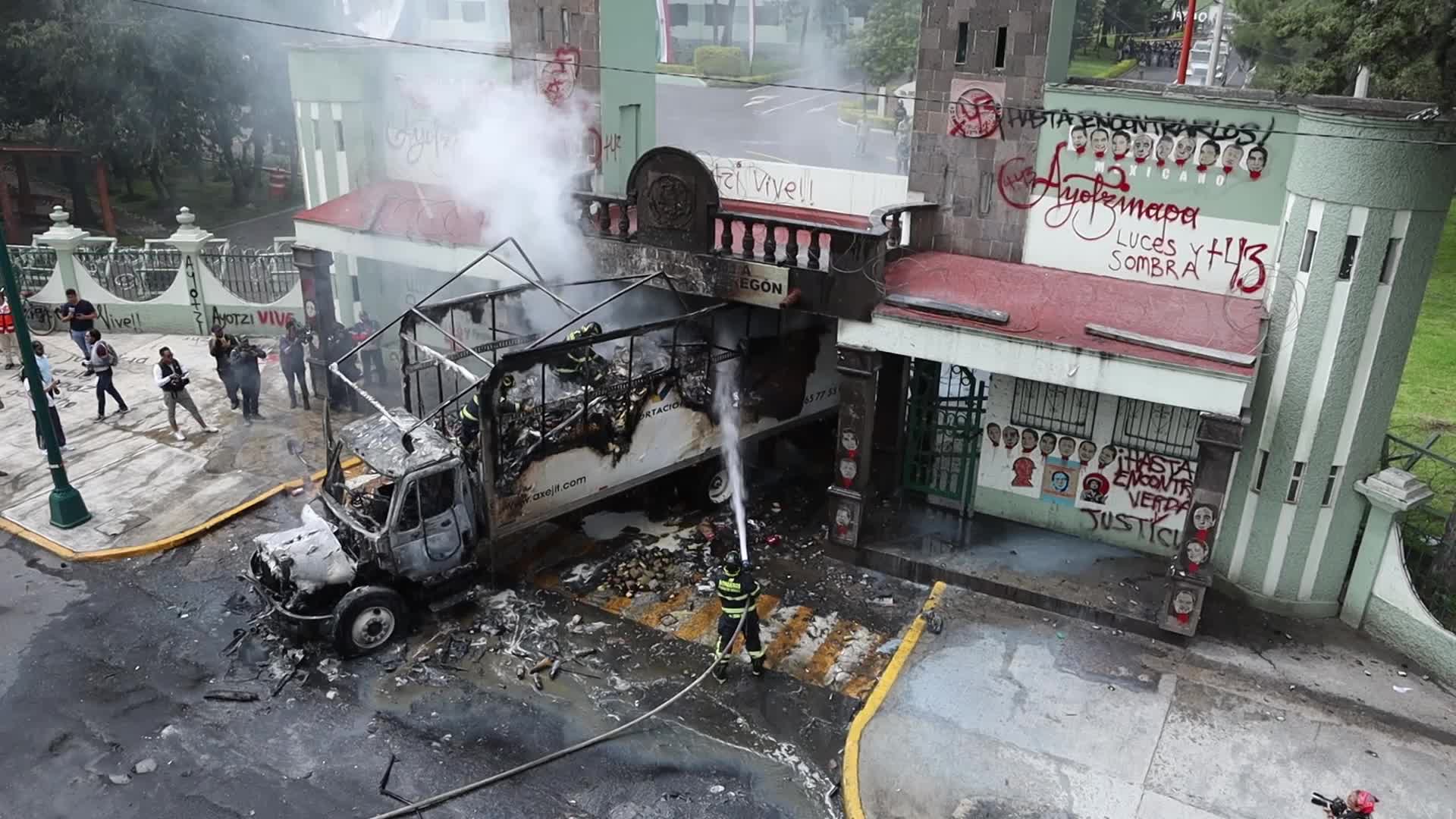 Friends and family members of the 43 missing students from Ayotzinapa held a protest at Military Camp No. 1-A.
