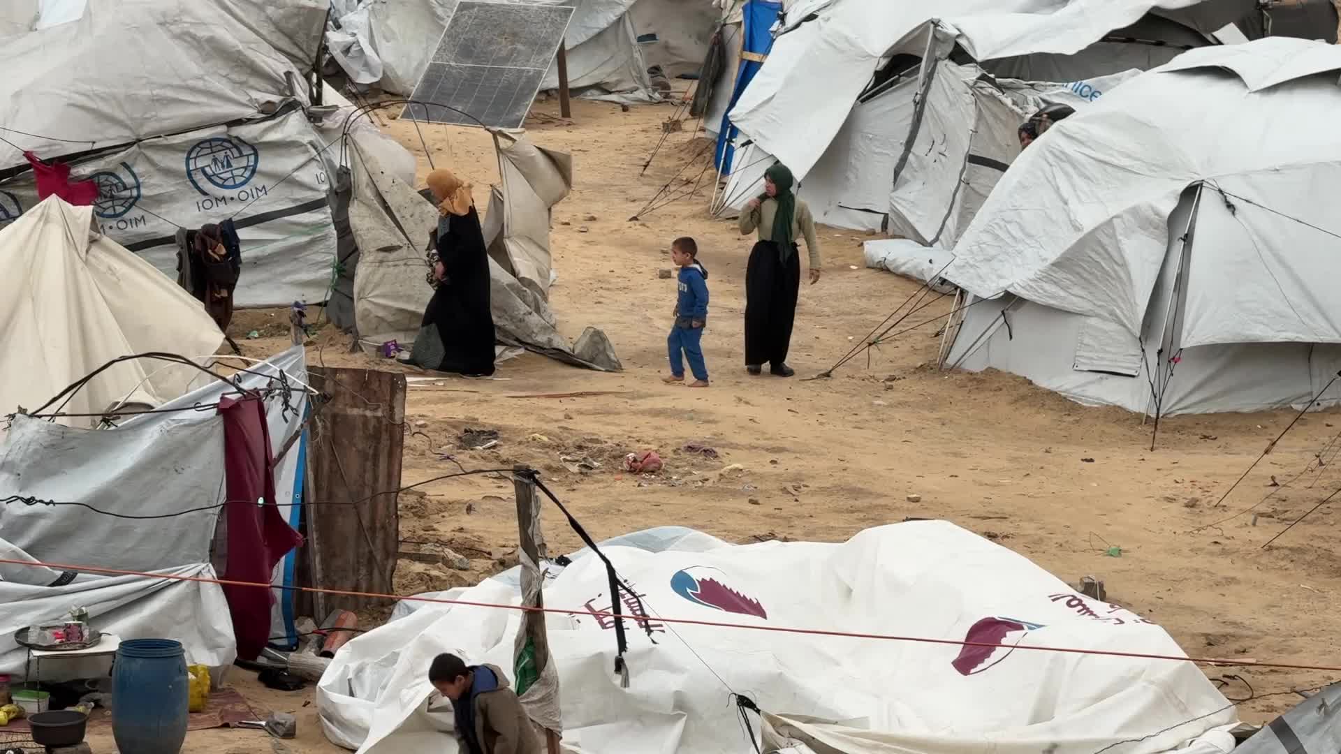 Tent Shelters Line Gaza City Shore Amid Winter Winds