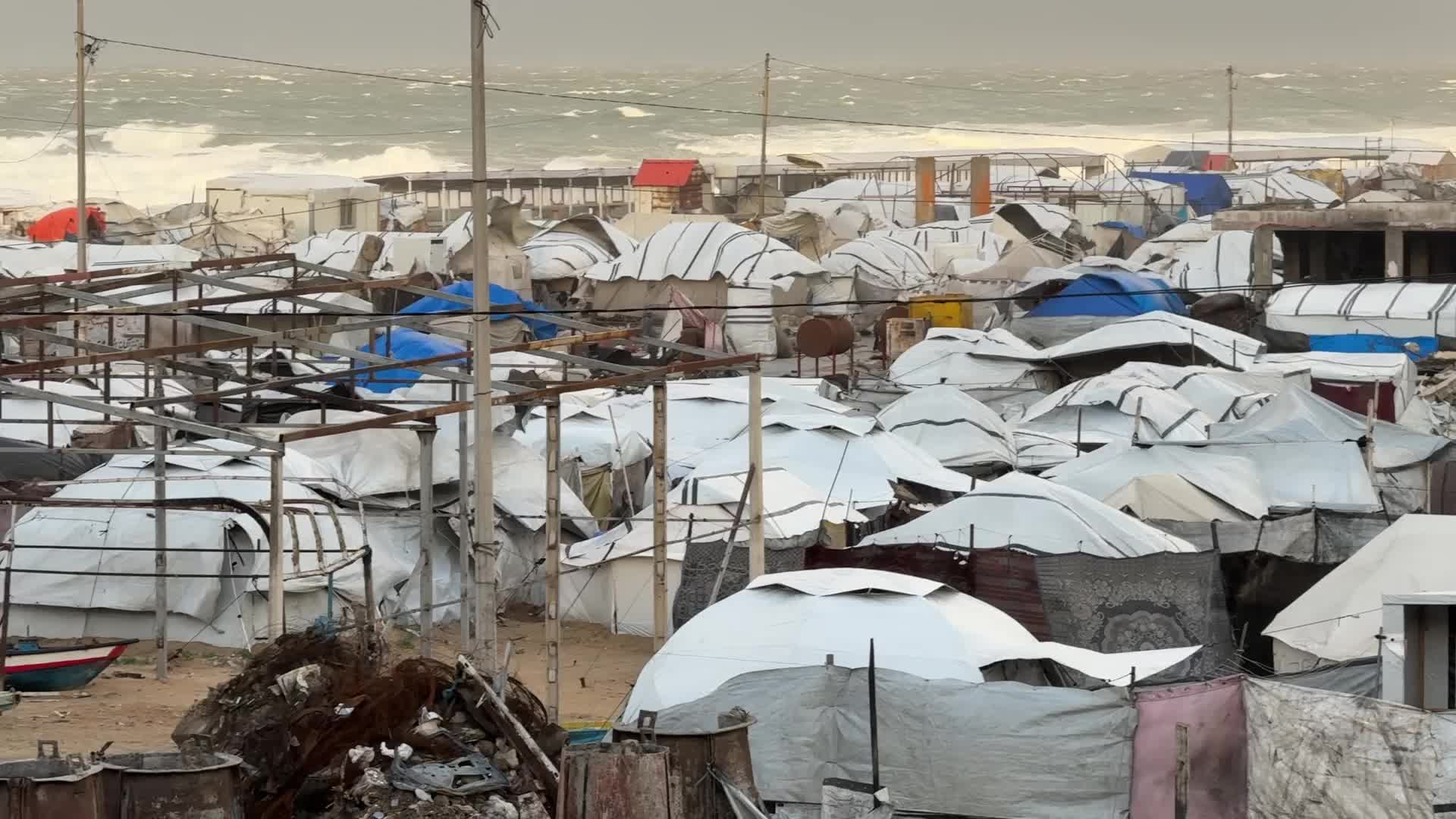 Tent Shelters Line Gaza City Shore Amid Winter Winds