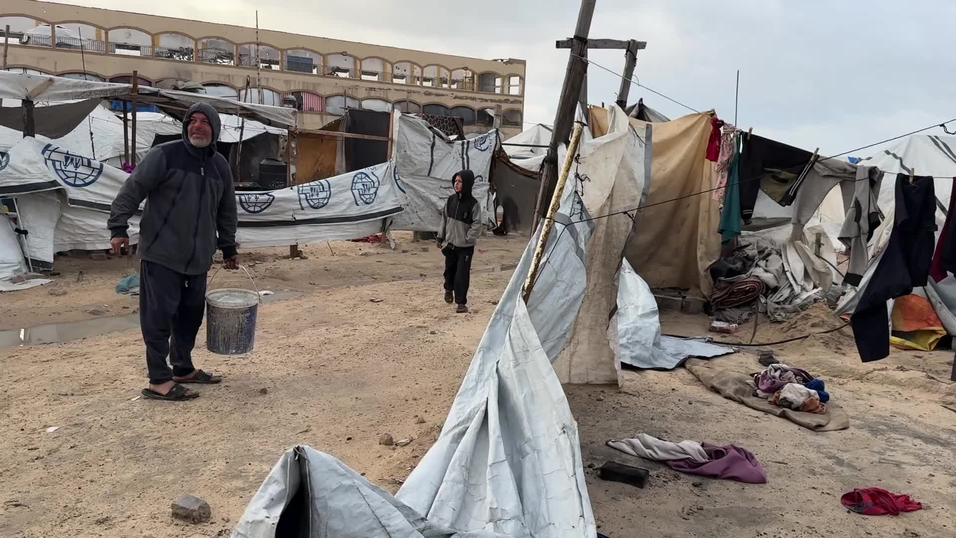 Tent Shelters Line Gaza City Shore Amid Winter Winds