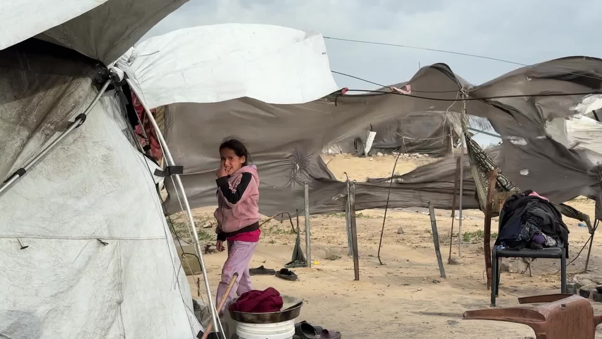 Tent Shelters Line Gaza City Shore Amid Winter Winds
