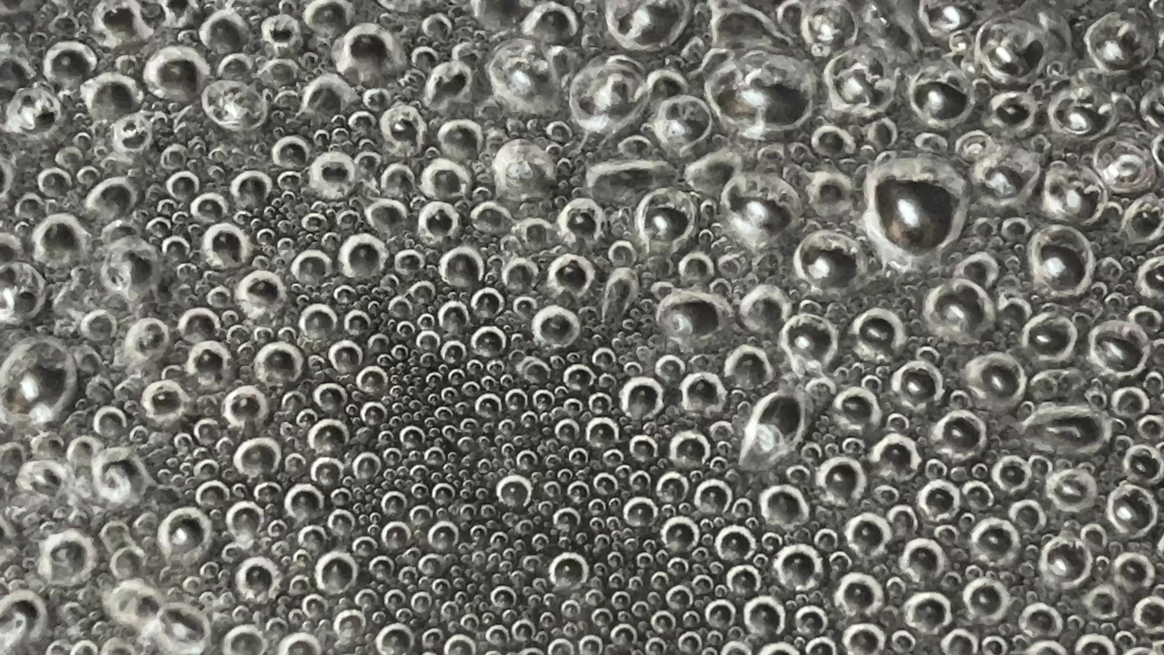 Close-up of water boiling in a pan